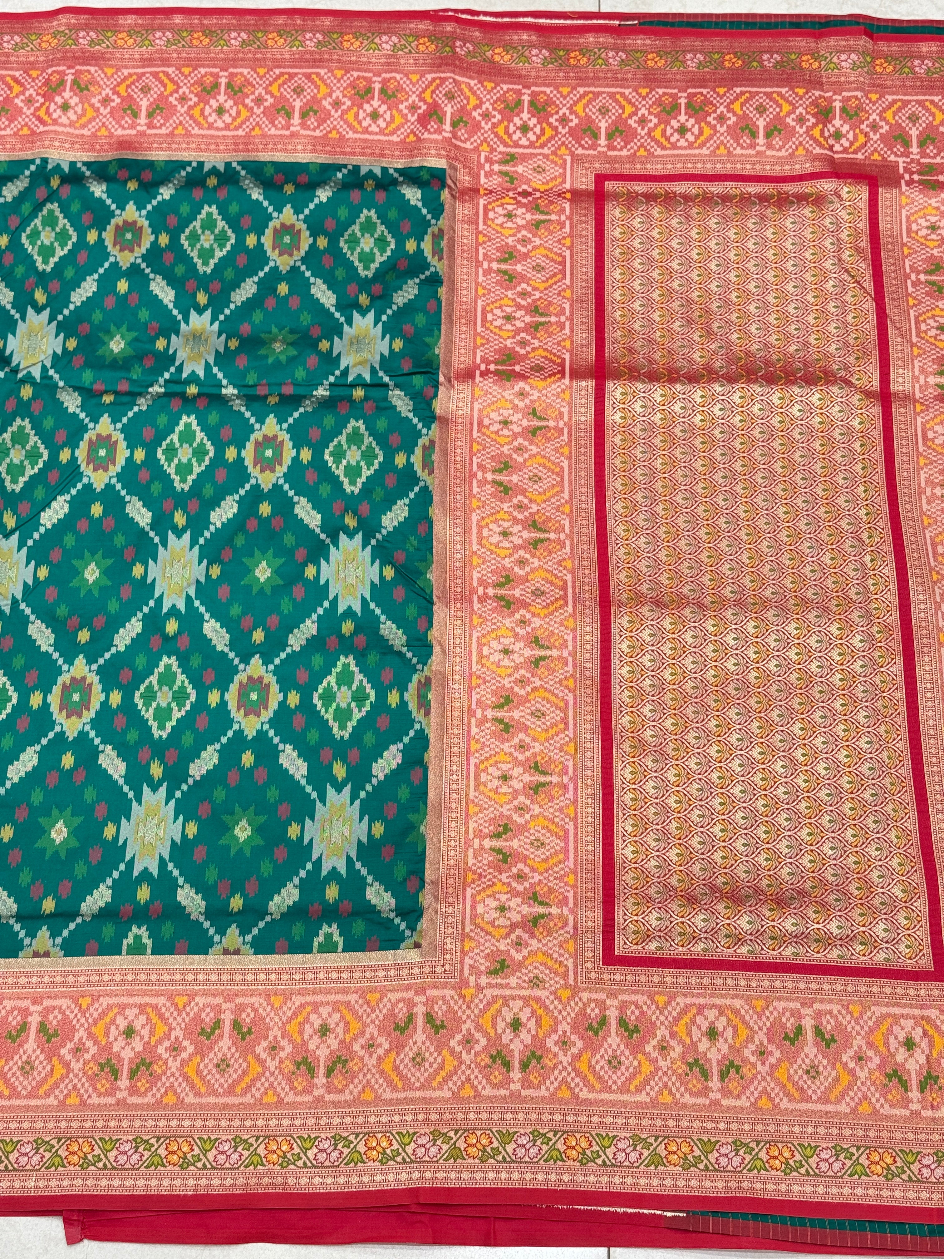 Bottle Green Banarasi Patola Tissue Style Border and Pallu