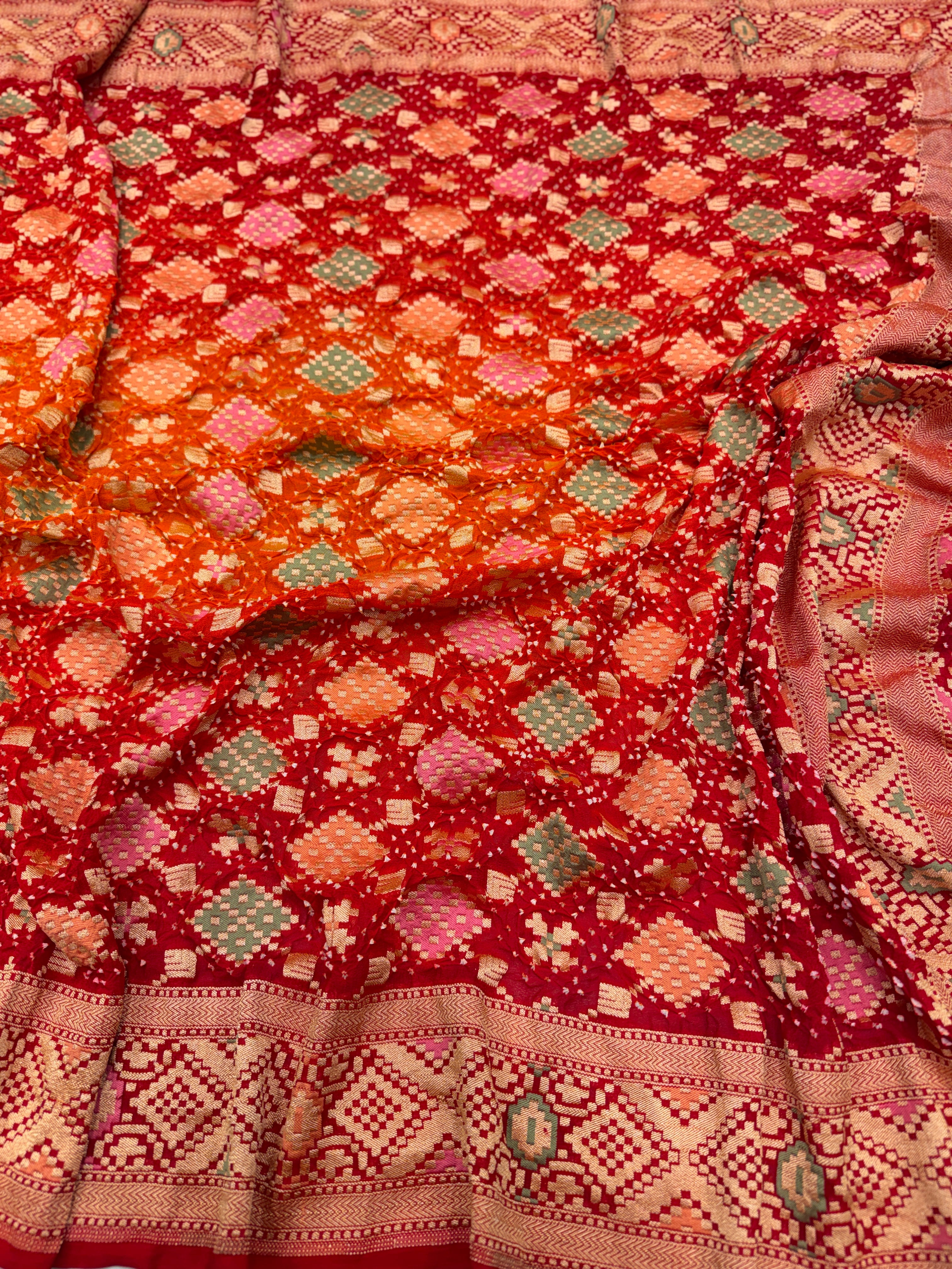 Orange Red Shaded Patola Weave Meenakari Georgette Bandhej Saree