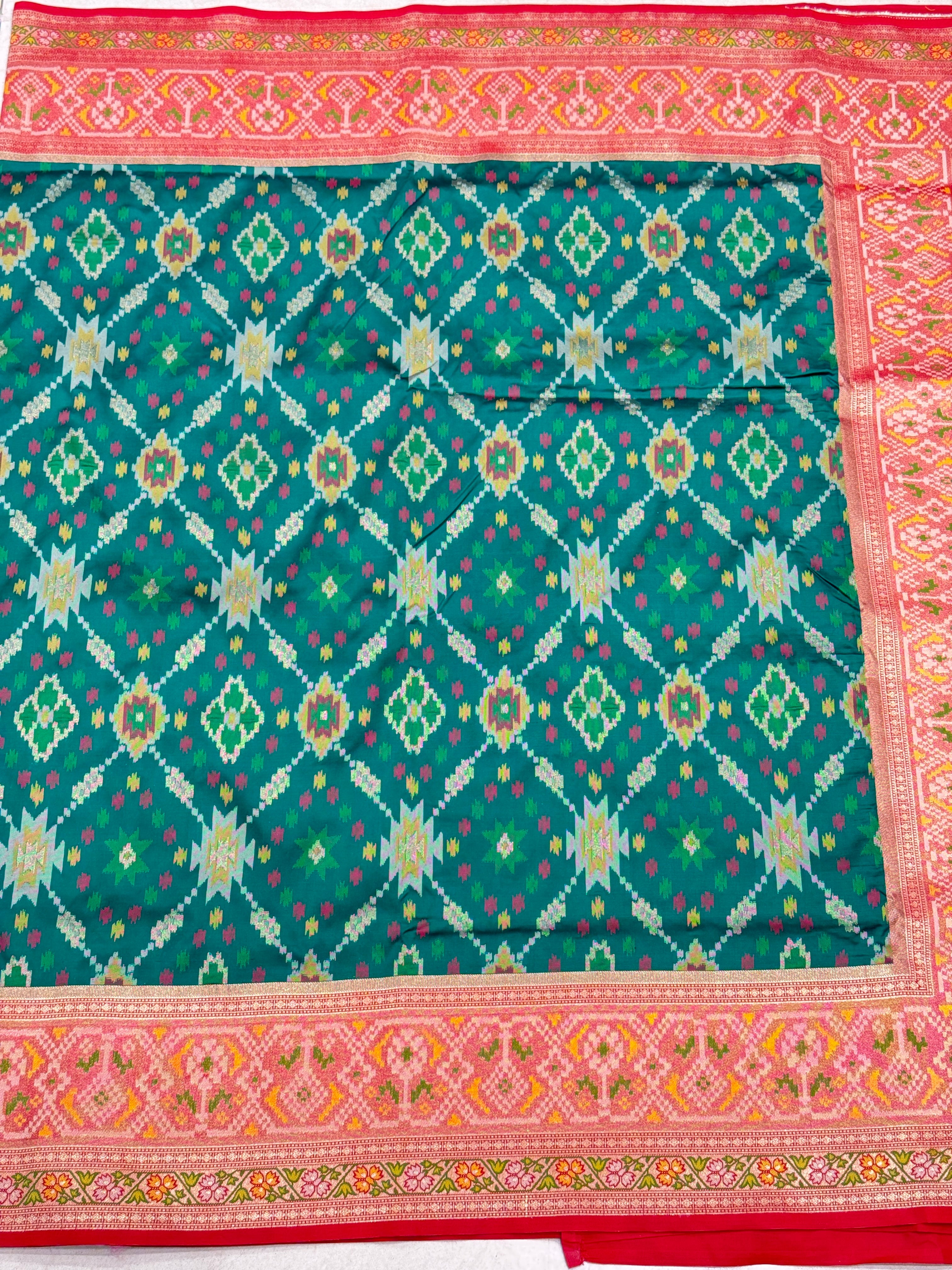 Bottle Green Banarasi Patola Tissue Style Border and Pallu