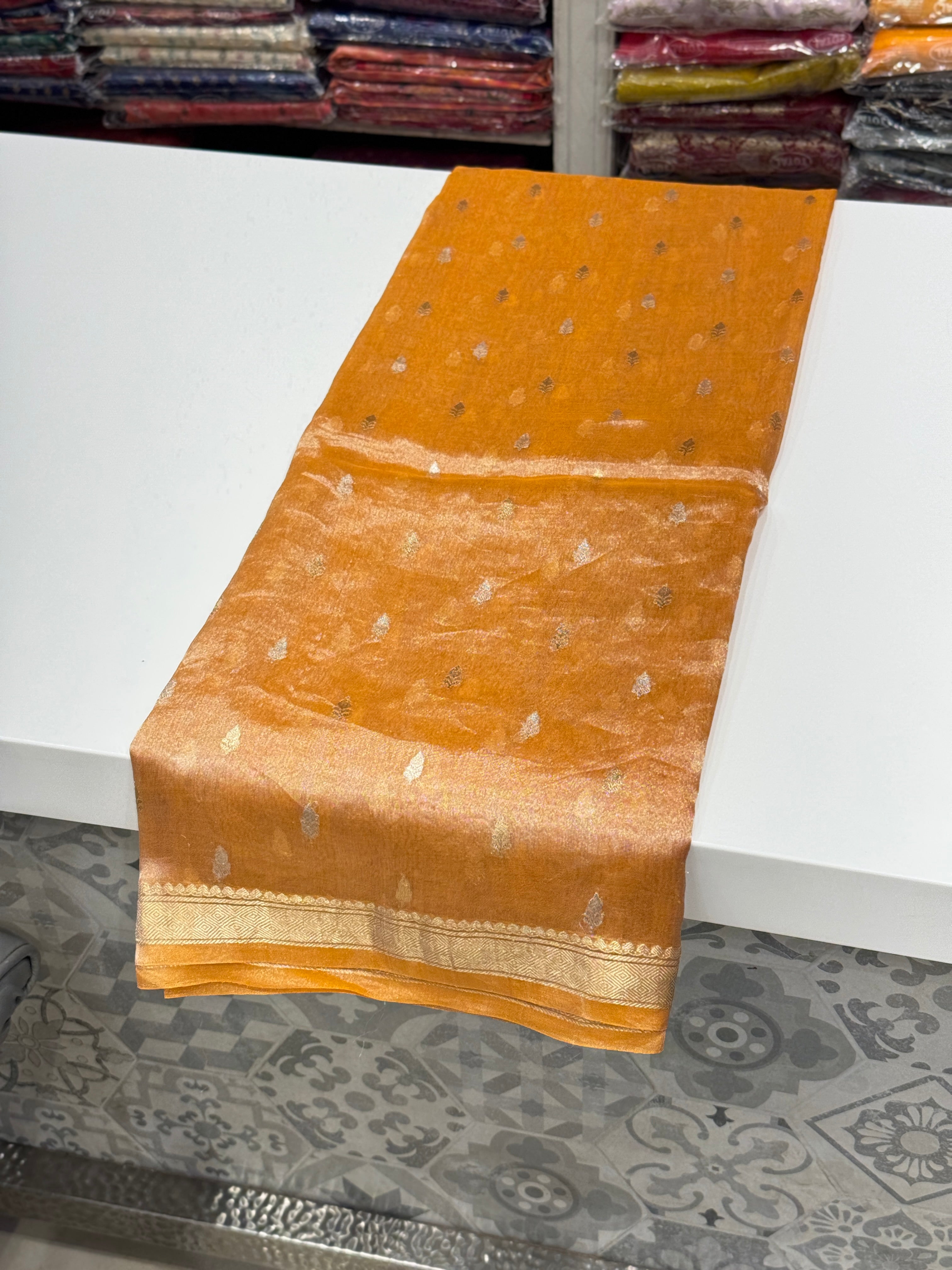 Orange Handloom Tissue Kadwa Buttis Silver Saree
