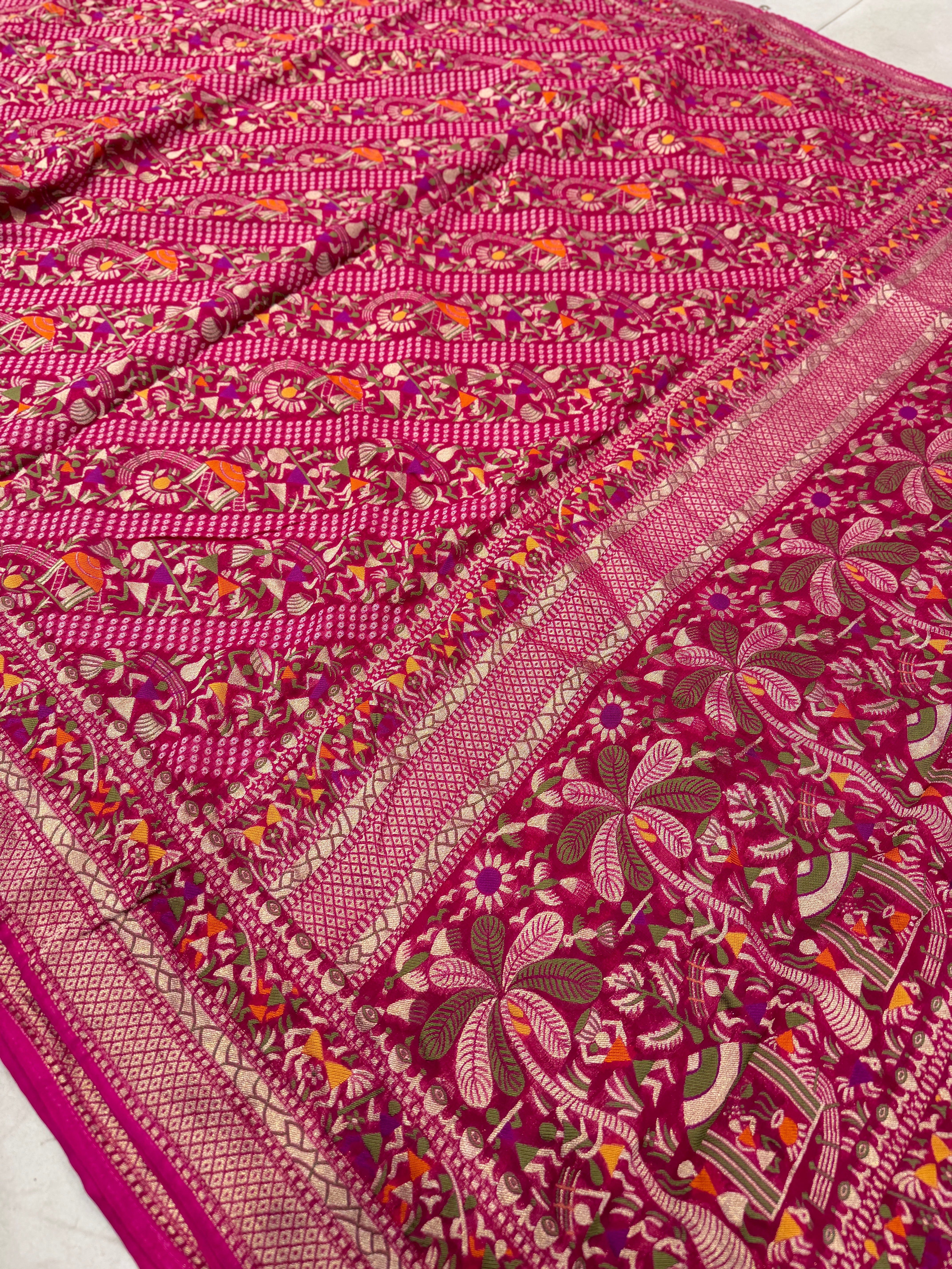 Rani Pink Warli Style Woven Bandhej Georgette Saree