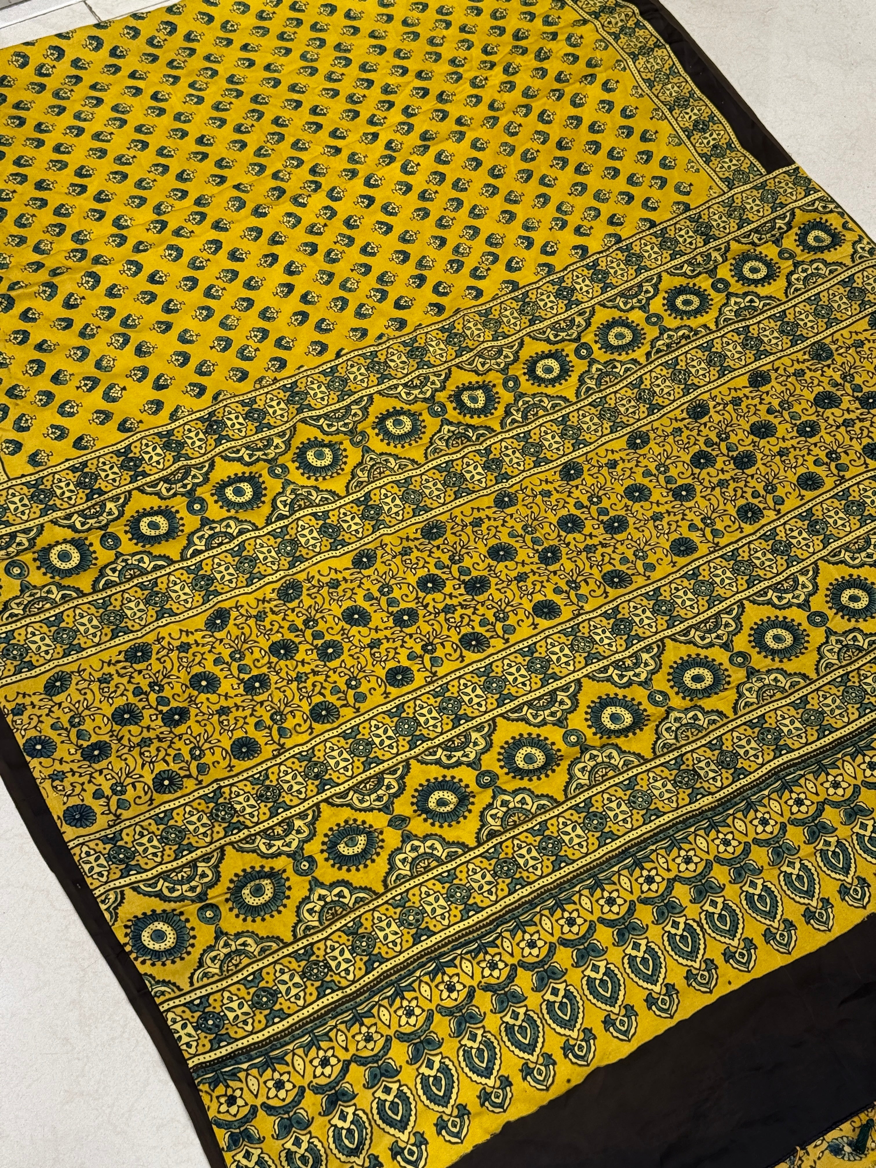 Yellow Floral Butti Ajrakh Modal Gajji Silk Saree