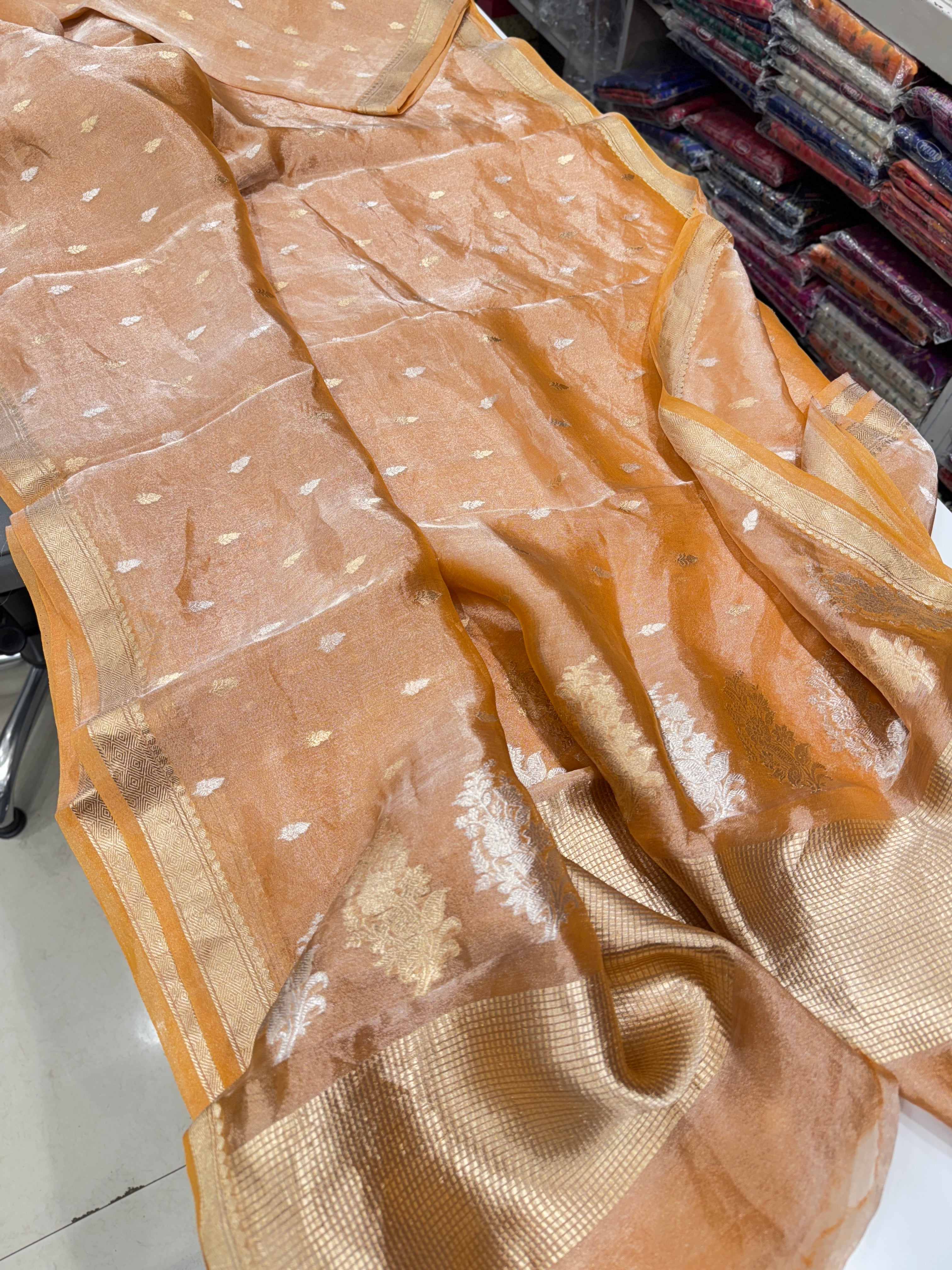 Orange Handloom Tissue Kadwa Buttis Silver Saree
