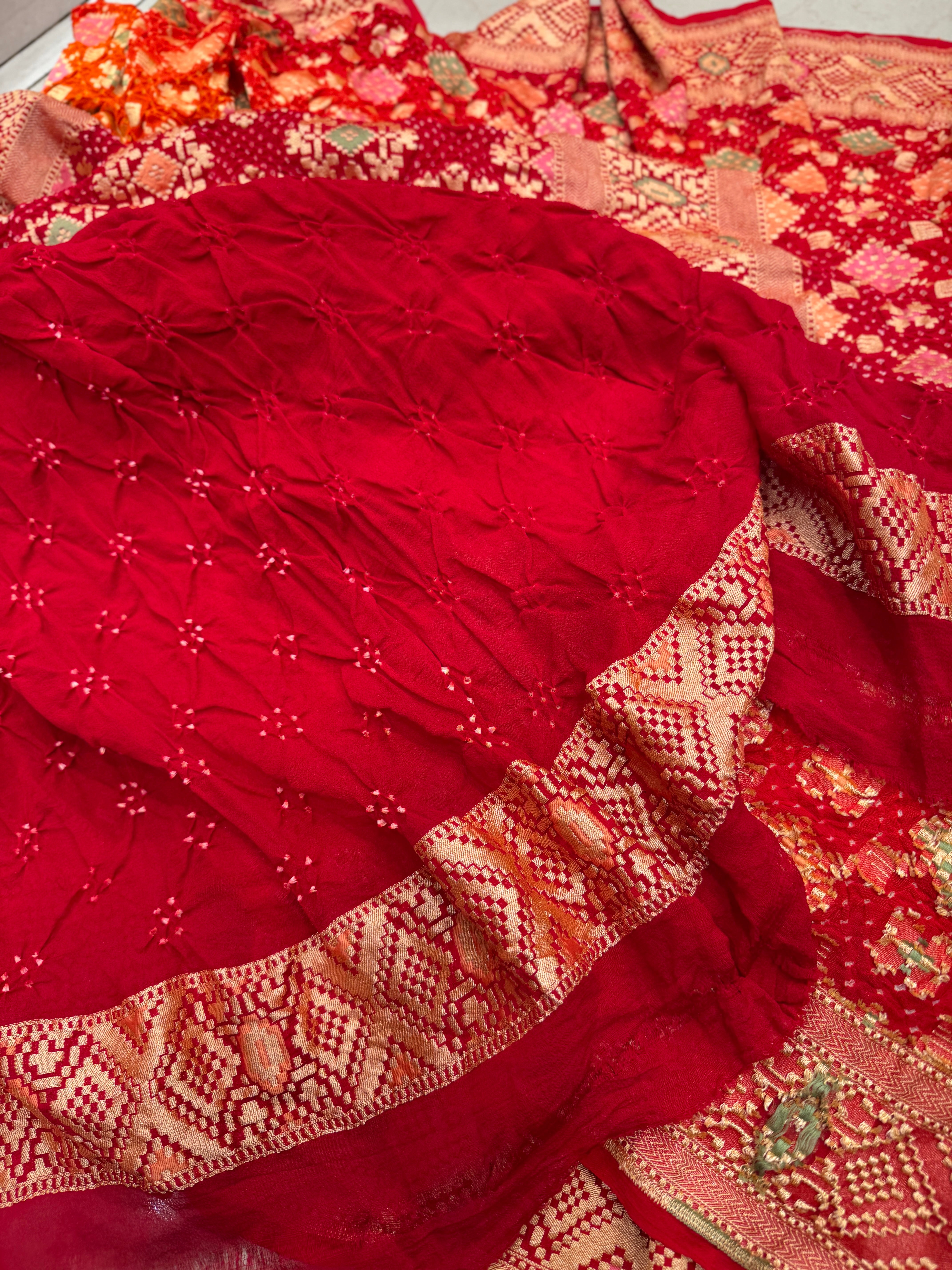 Orange Red Shaded Patola Weave Meenakari Georgette Bandhej Saree