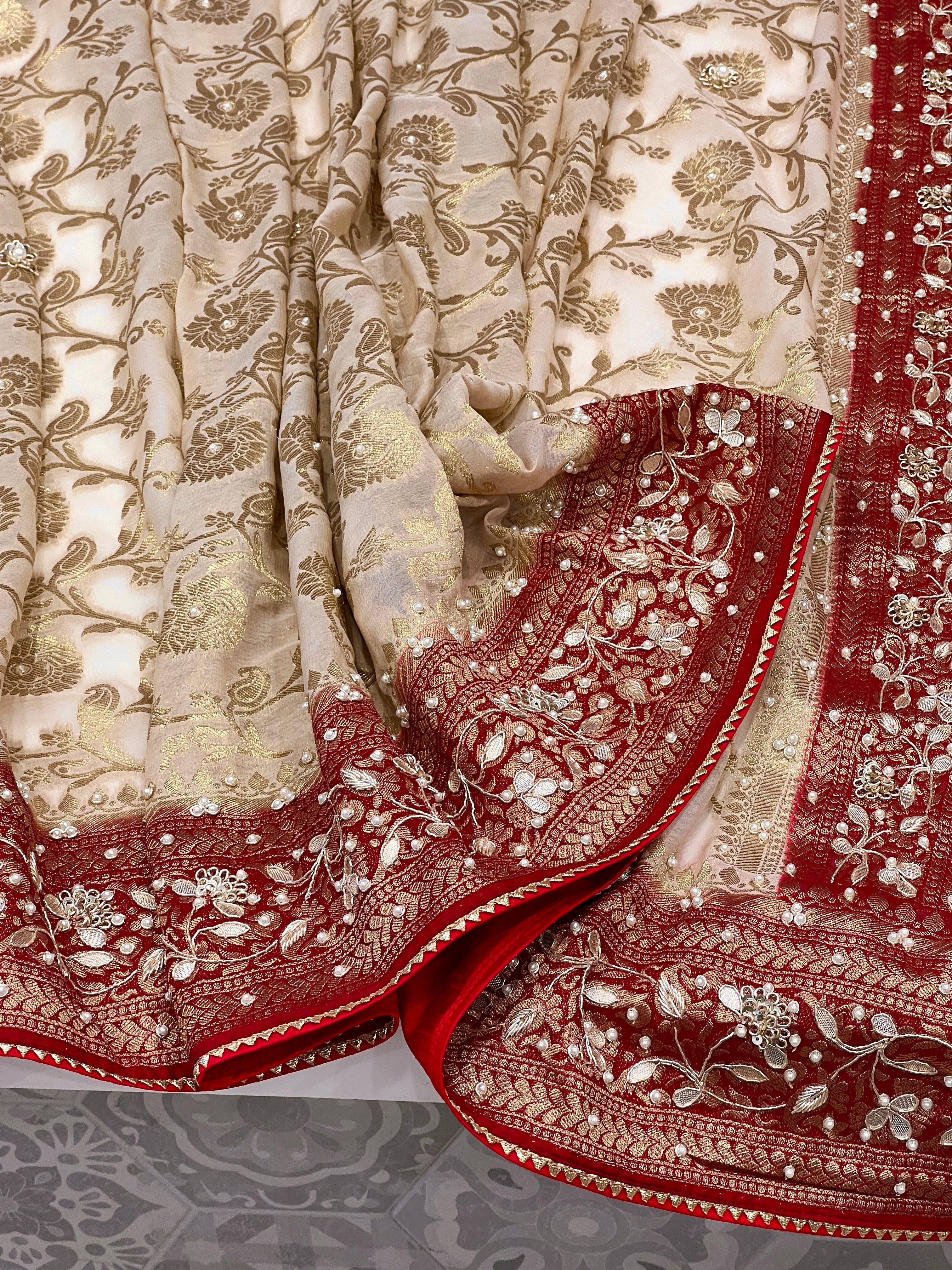 Beige Georgette Jaal Saree with Moti Hand Embroidery and Red Border