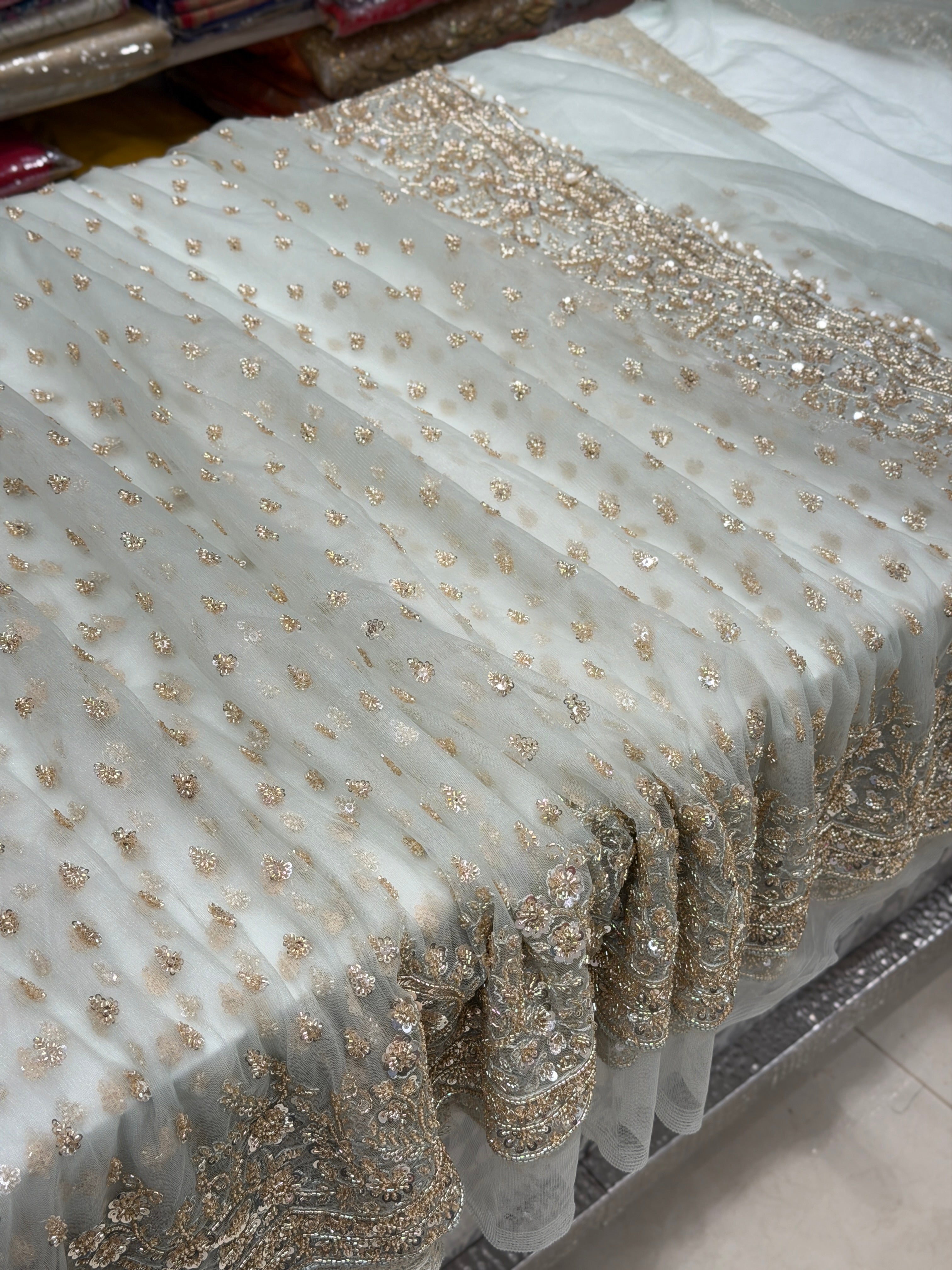 Light Blue Buttis Heavy Blouse Soft Net Embroidery Saree