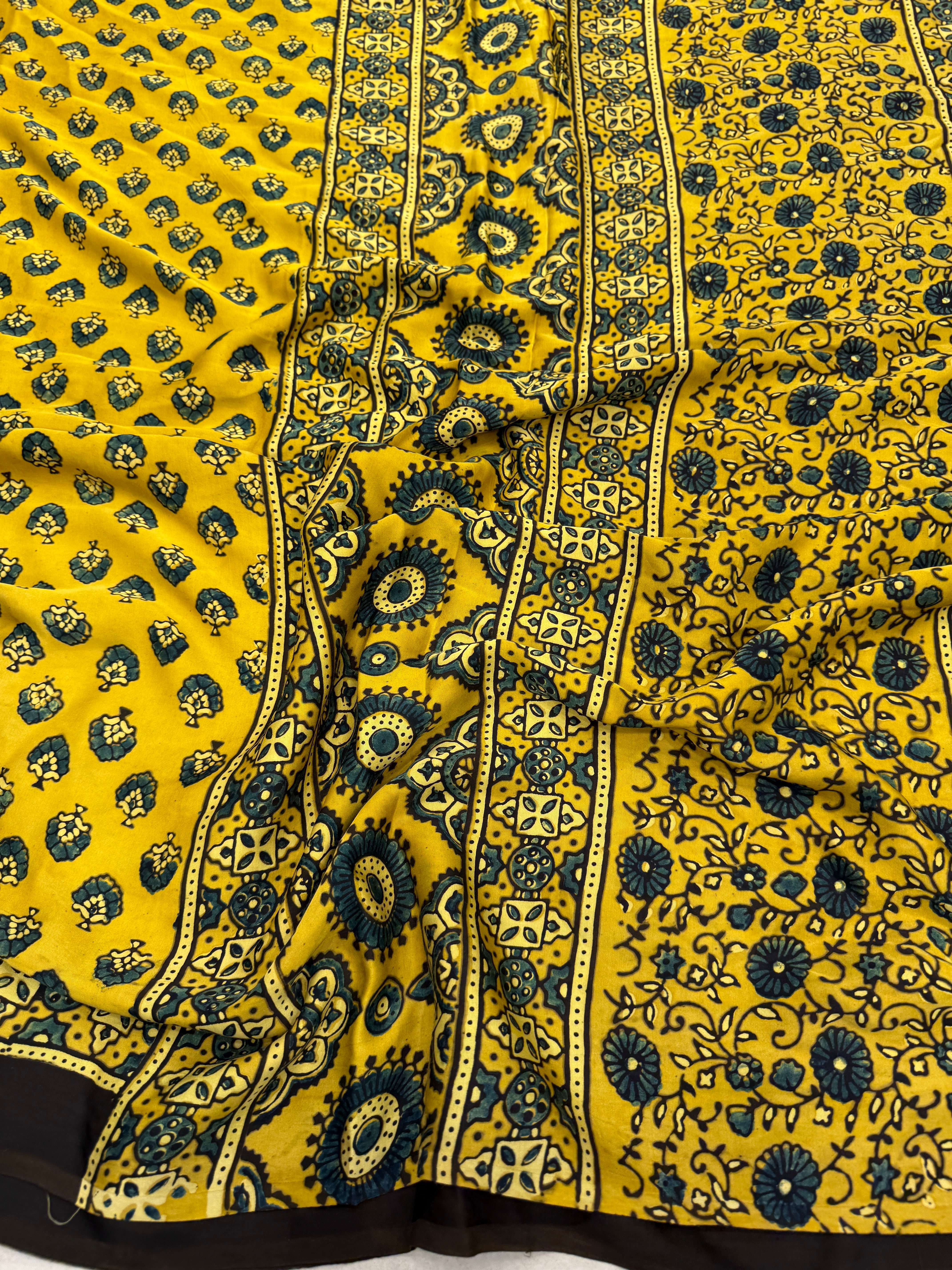 Yellow Floral Butti Ajrakh Modal Gajji Silk Saree