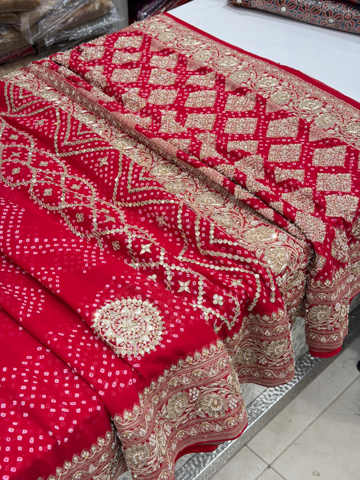 Red Rai Bandhej Georgette Saree Marodi Zardosi Hand Embroidery Saree