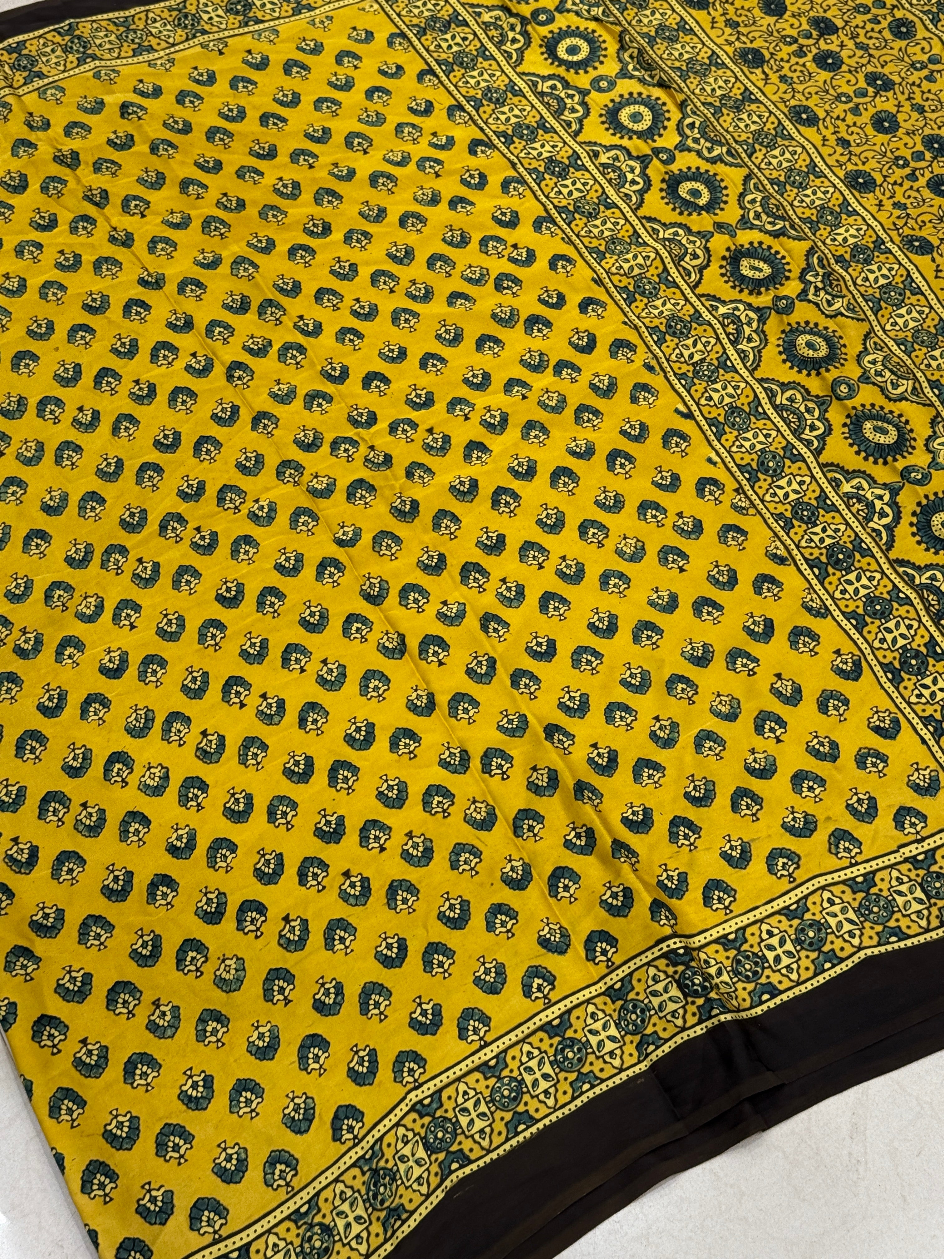 Yellow Floral Butti Ajrakh Modal Gajji Silk Saree