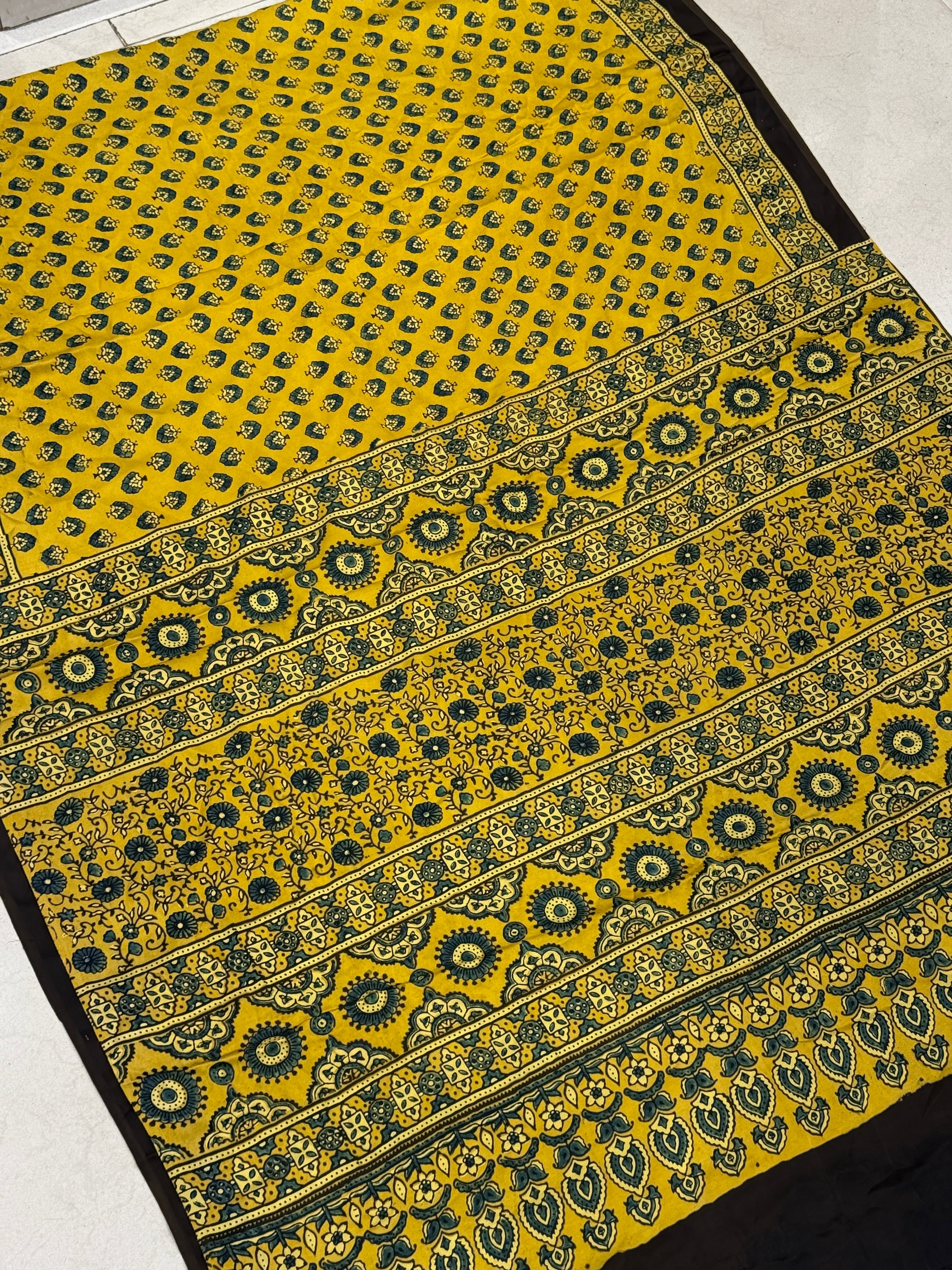 Yellow Floral Butti Ajrakh Modal Gajji Silk Saree