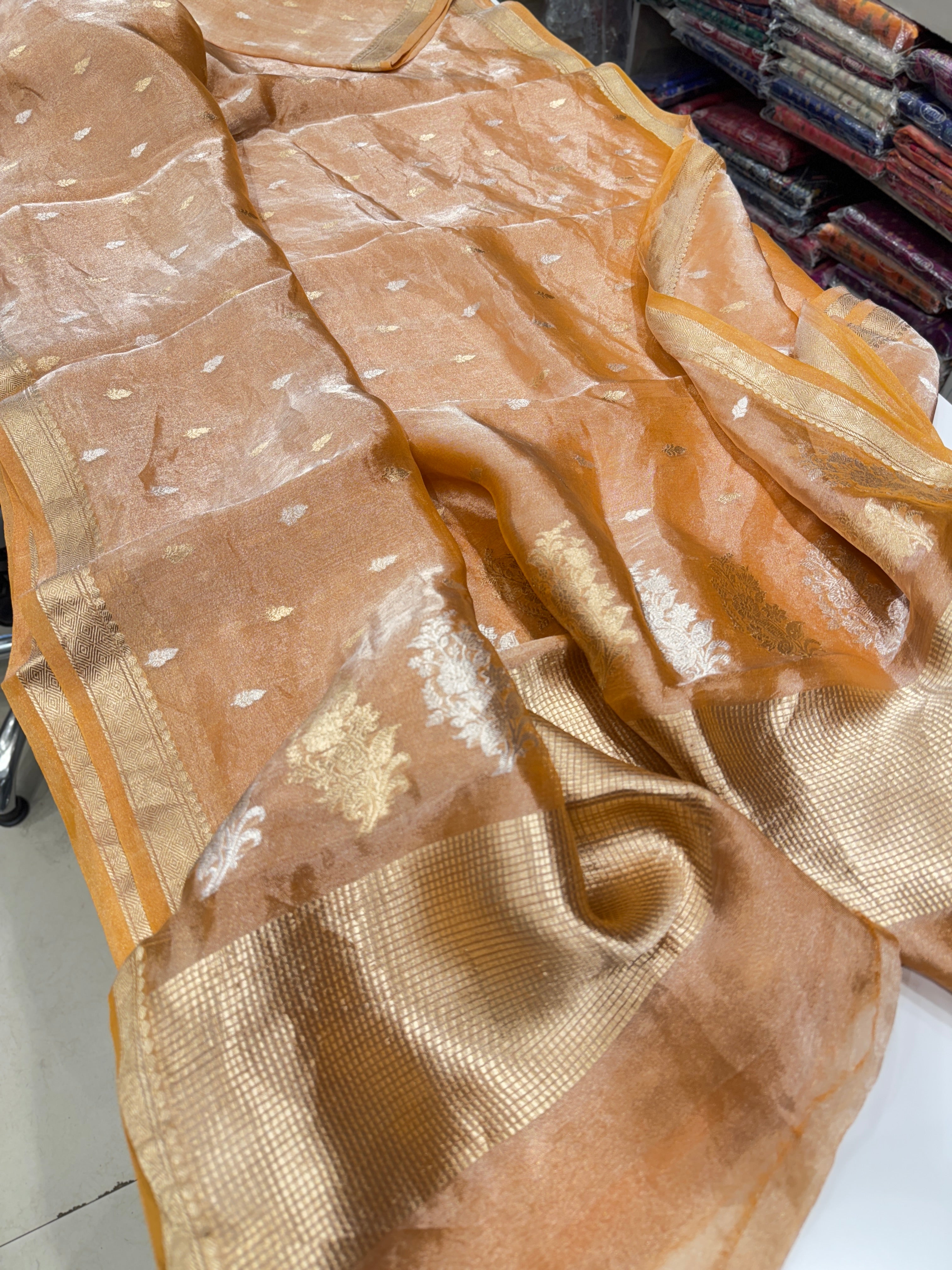 Orange Handloom Tissue Kadwa Buttis Silver Saree
