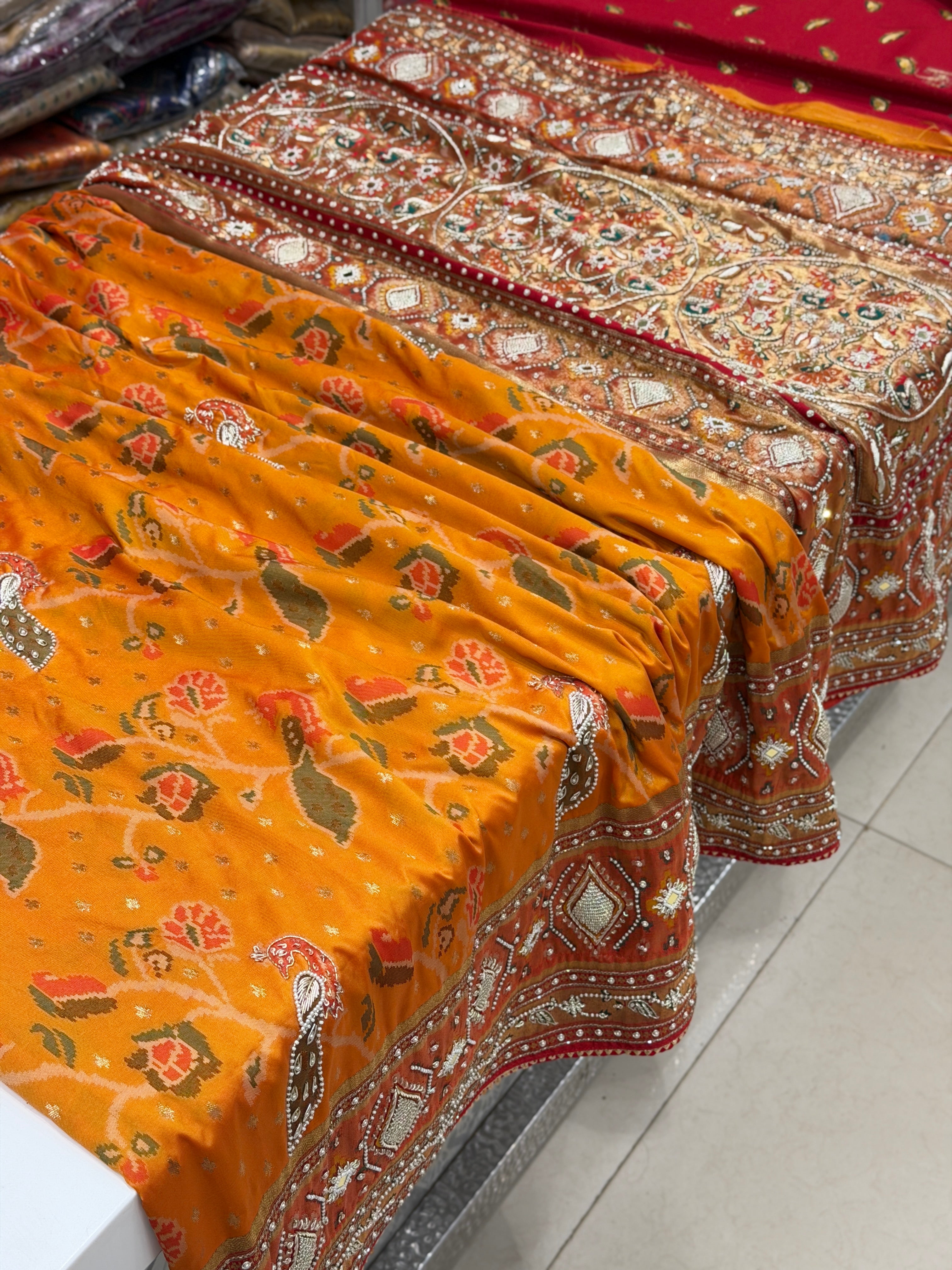 Rust Orange Patola Peacock Motif Zardosi Hand Embroidery Saree
