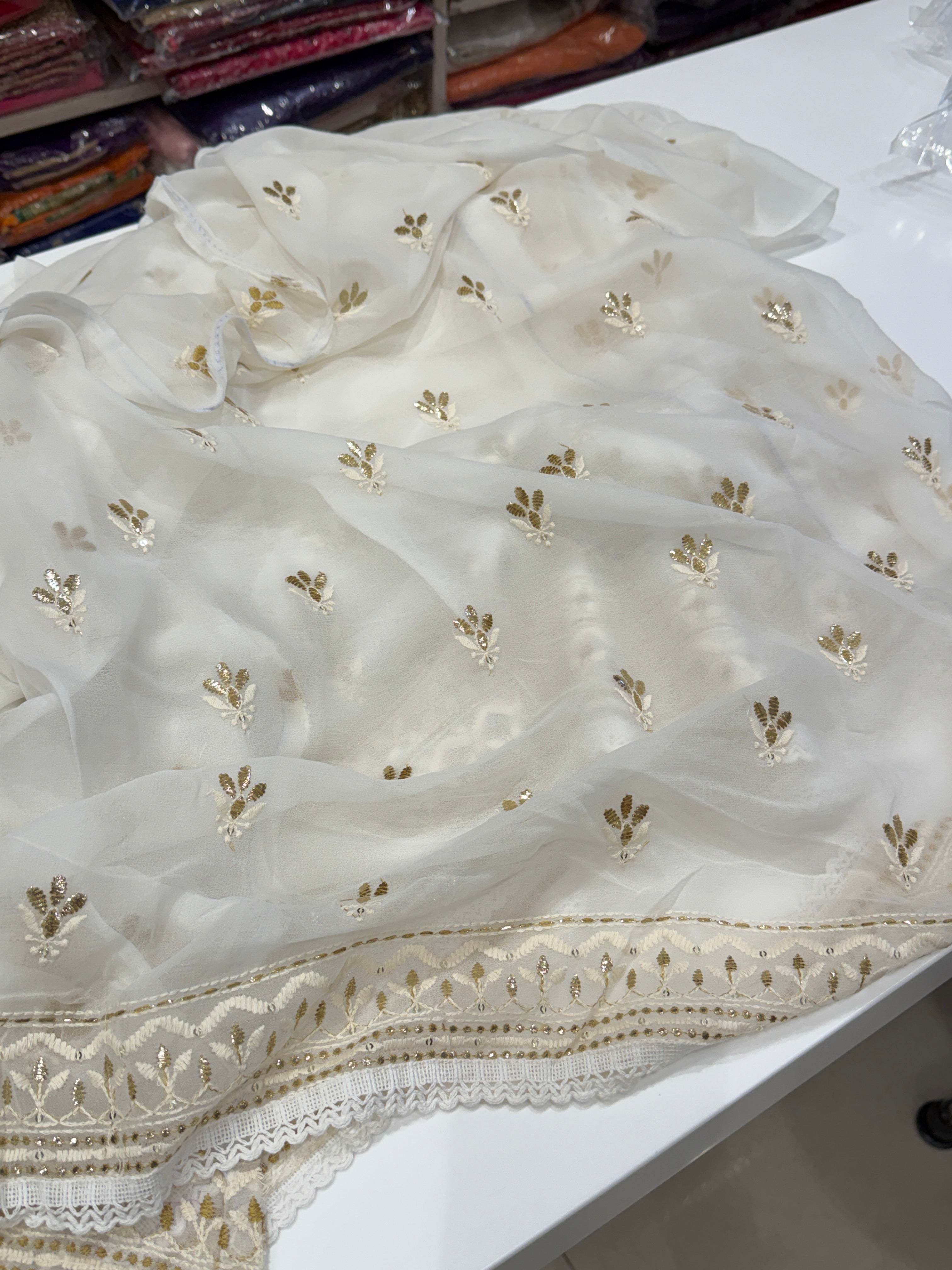 White Georgette Badla Embroidery Buttis Chikankari Saree