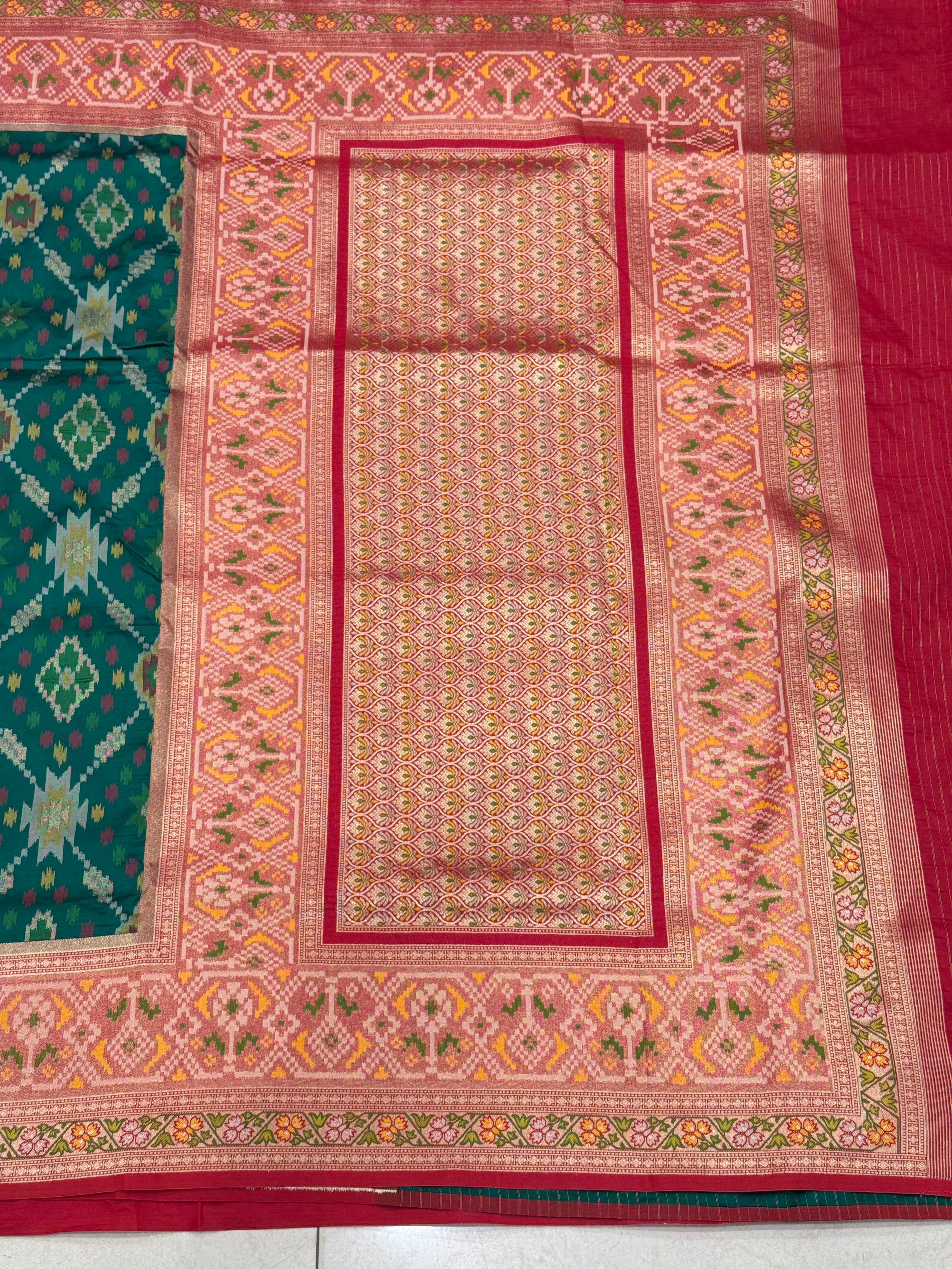 Bottle Green Banarasi Patola Tissue Style Border and Pallu