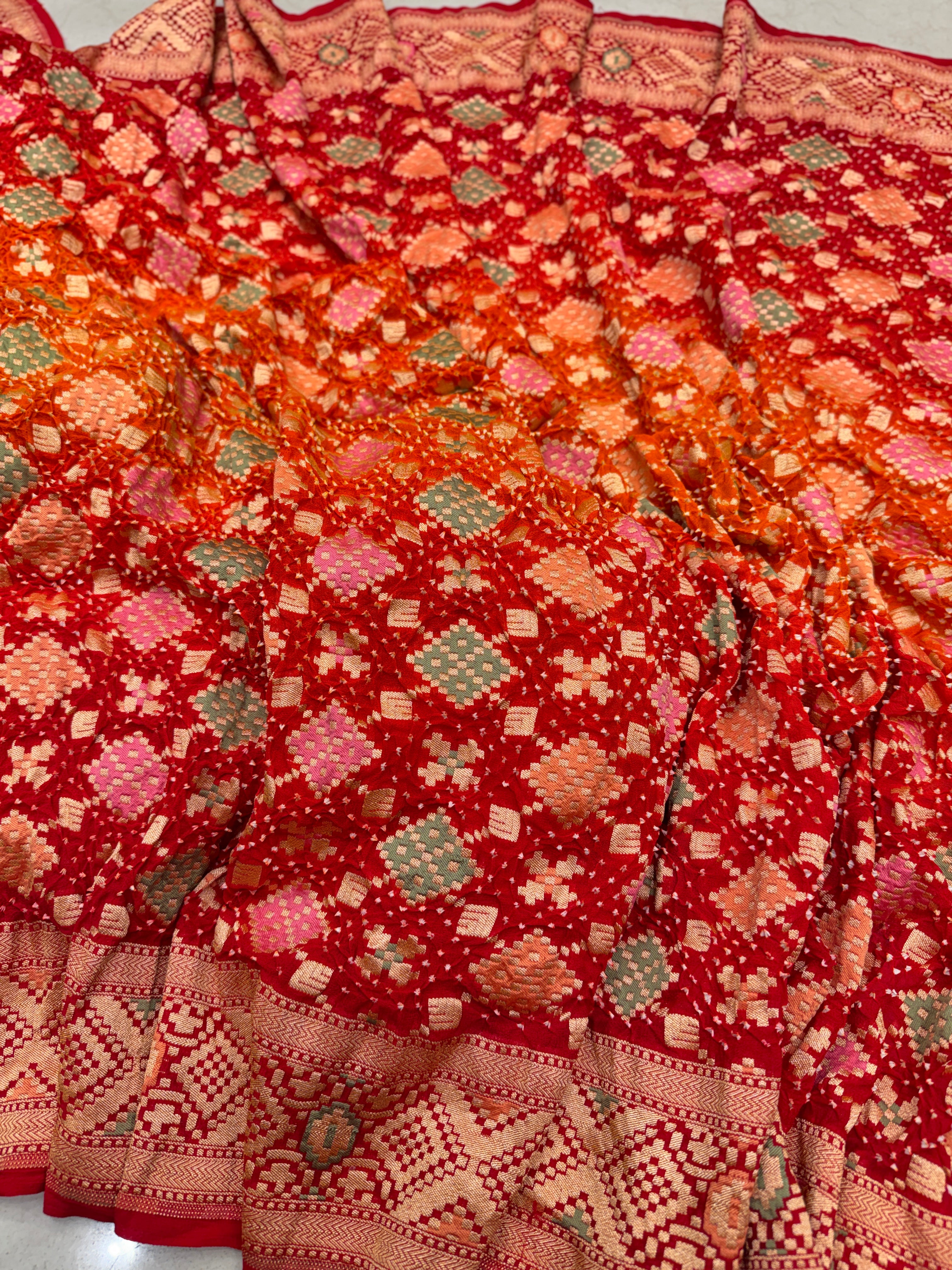 Orange Red Shaded Patola Weave Meenakari Georgette Bandhej Saree
