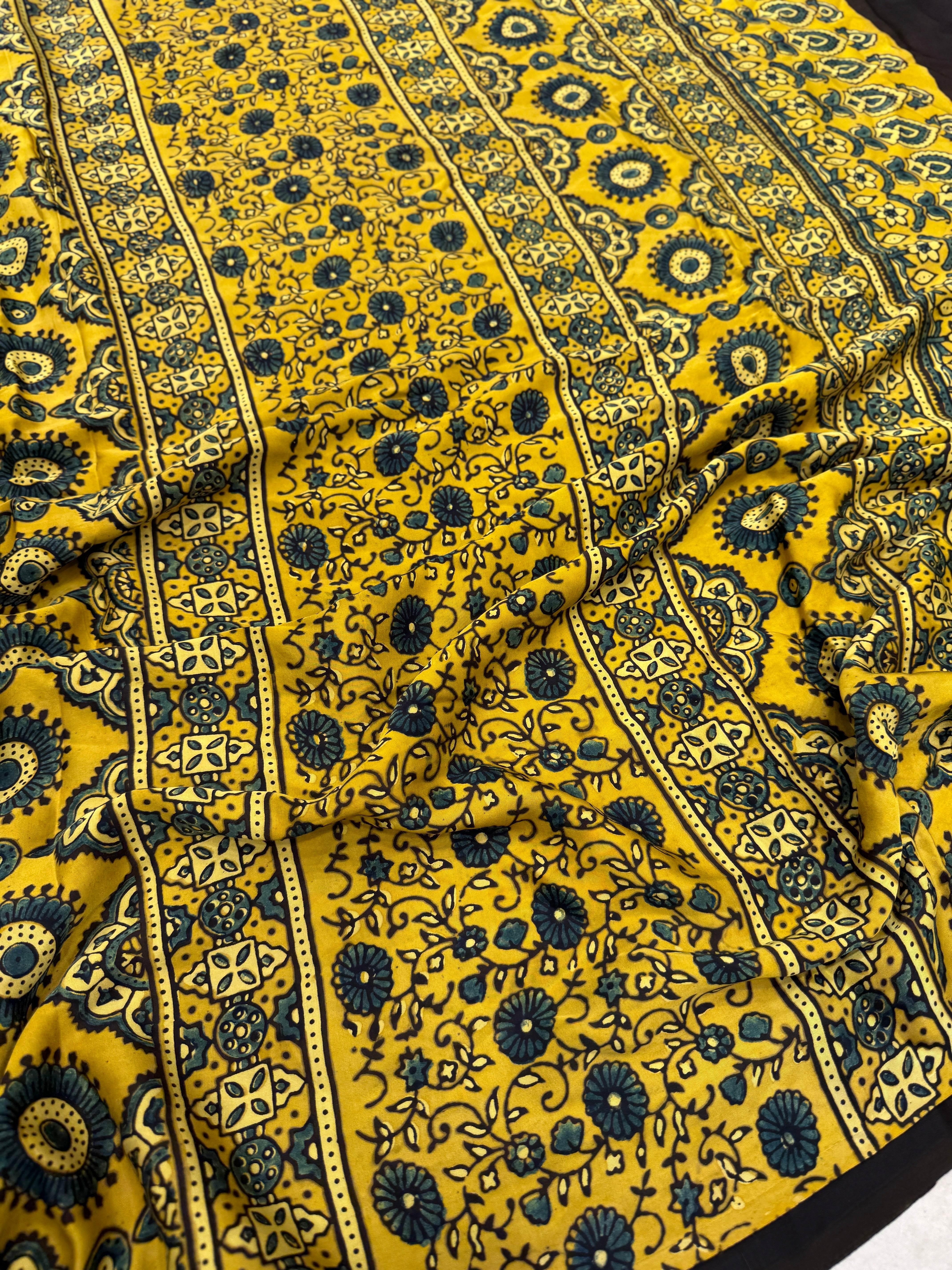 Yellow Floral Butti Ajrakh Modal Gajji Silk Saree