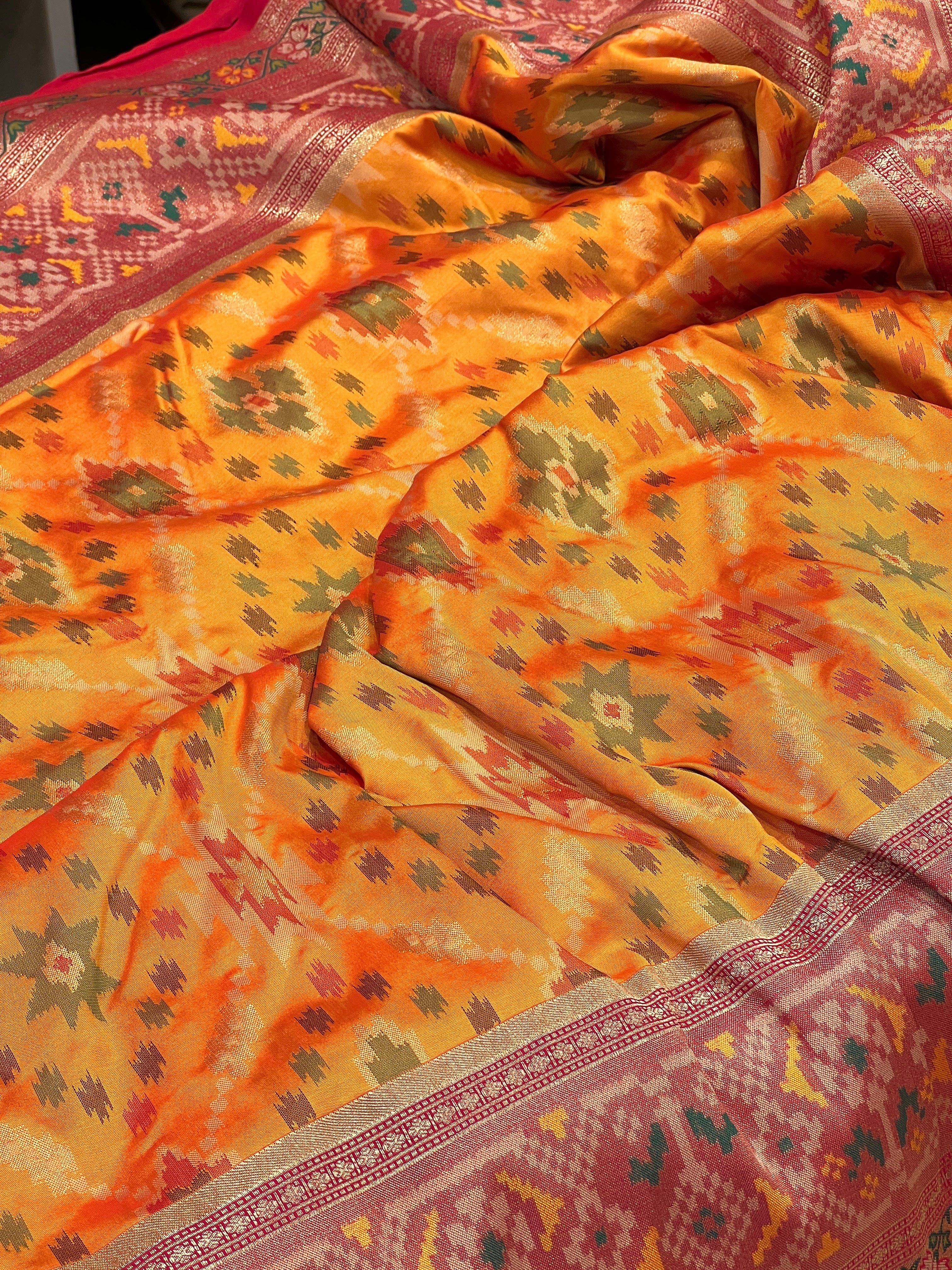 Light Orange Patola Saree with Contrast Blouse