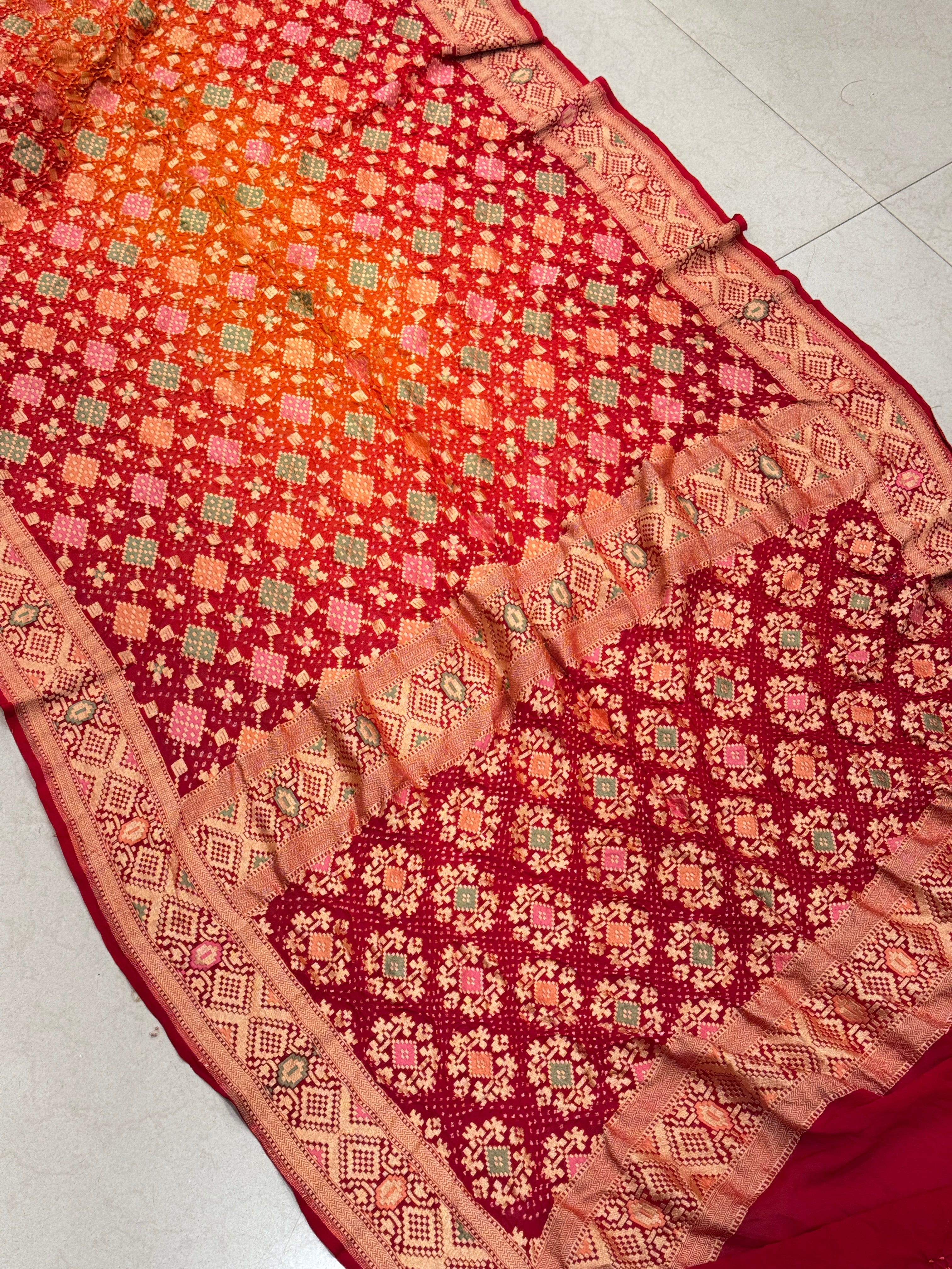 Orange Red Shaded Patola Weave Meenakari Georgette Bandhej Saree