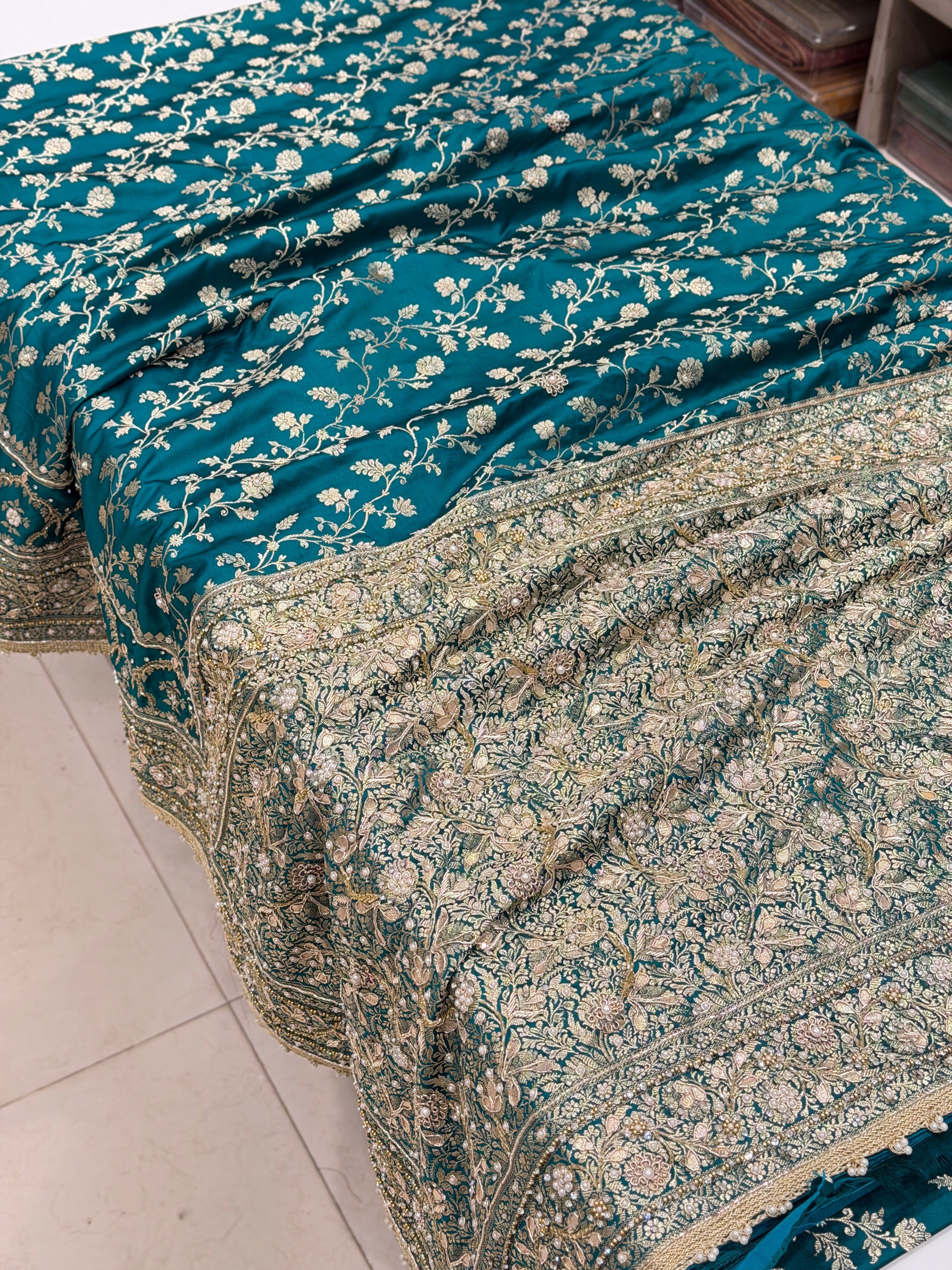 Warm Teal Green Banarasi Silk Crown Border Silk Embroidery Saree