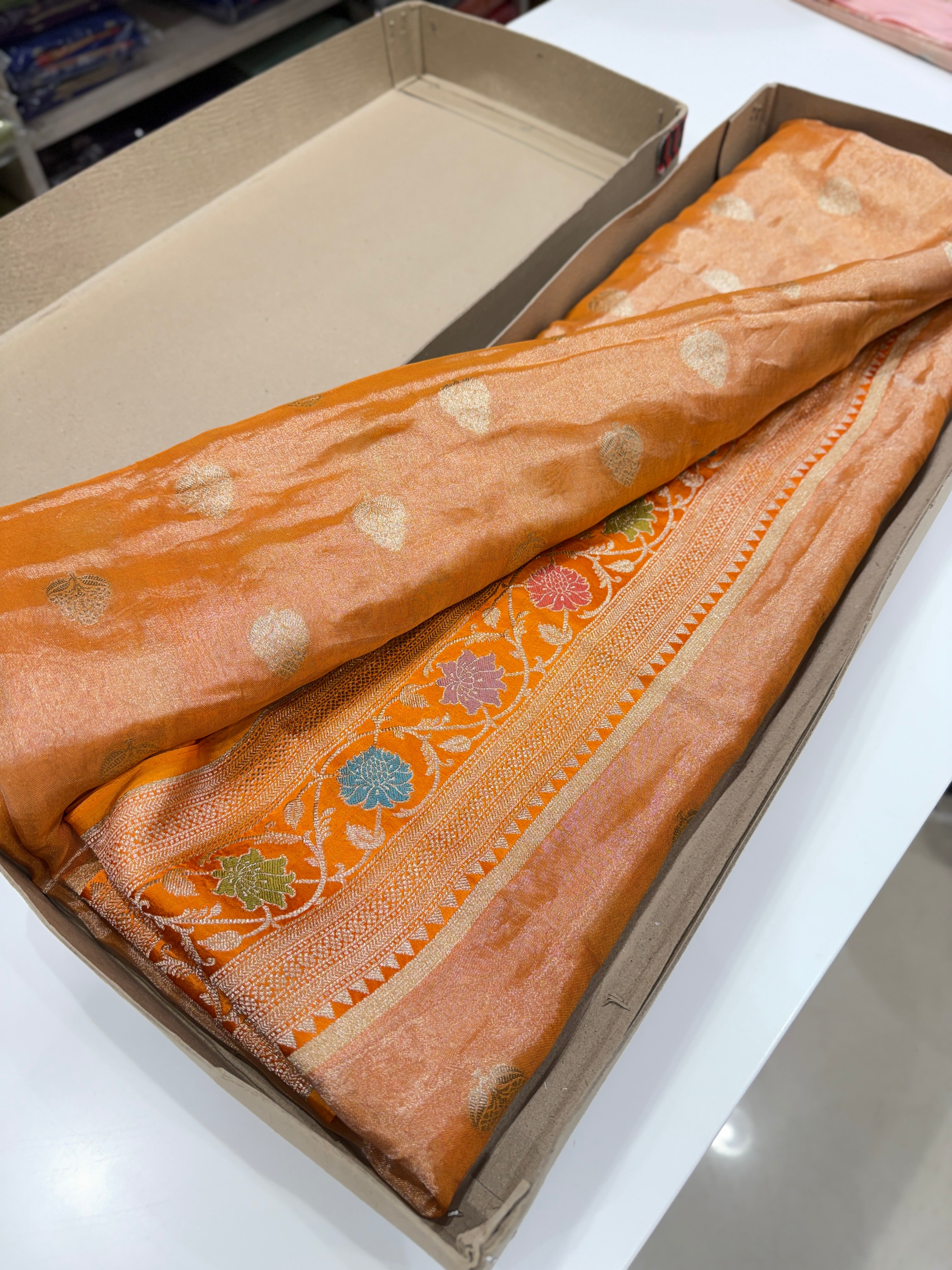 Rust Orange Banarasi Tissue Meenakari Satin Weaved Border Saree