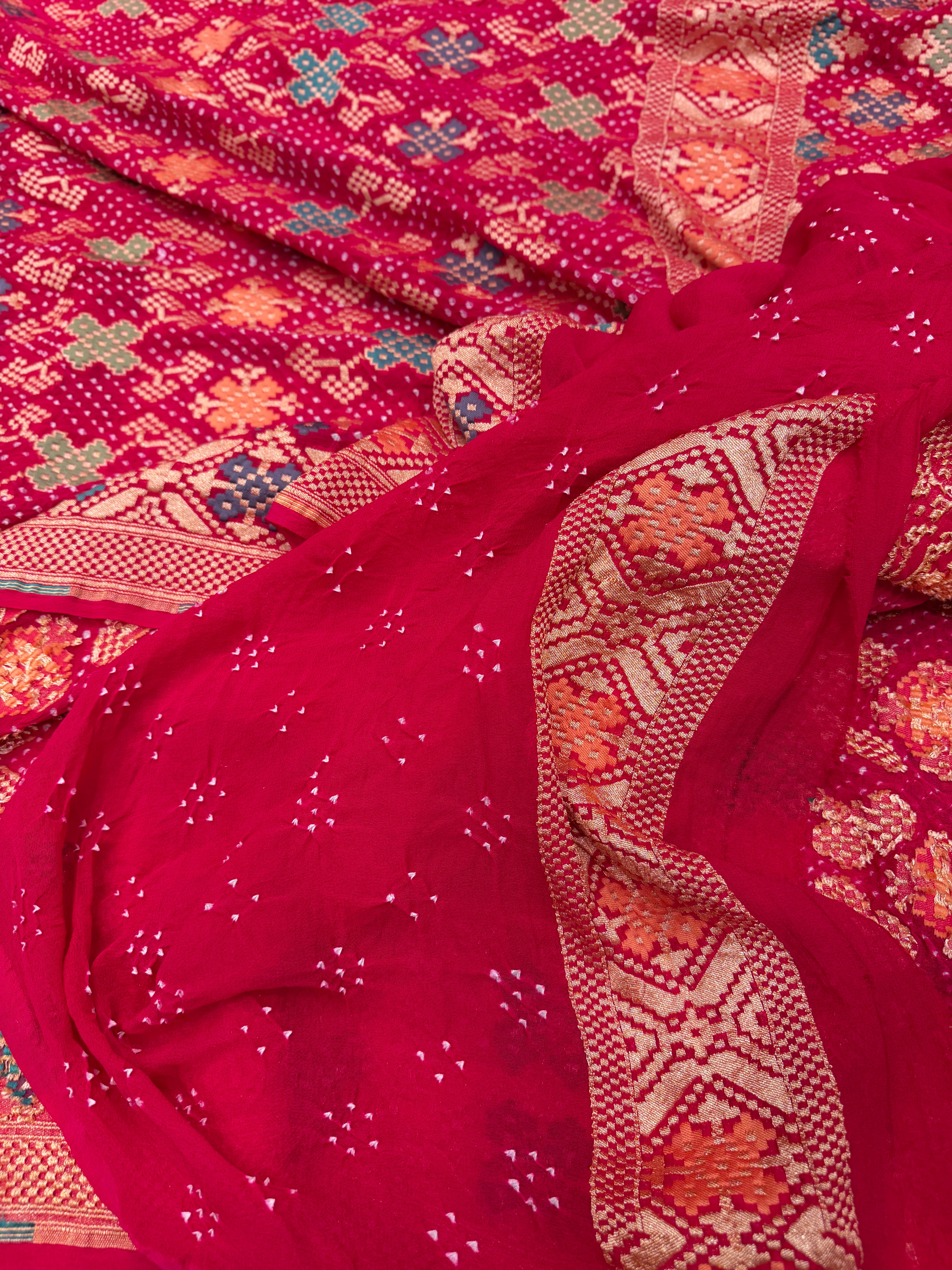 Crimson Rani Patola Weave Meenakari Georgette Bandhej Saree