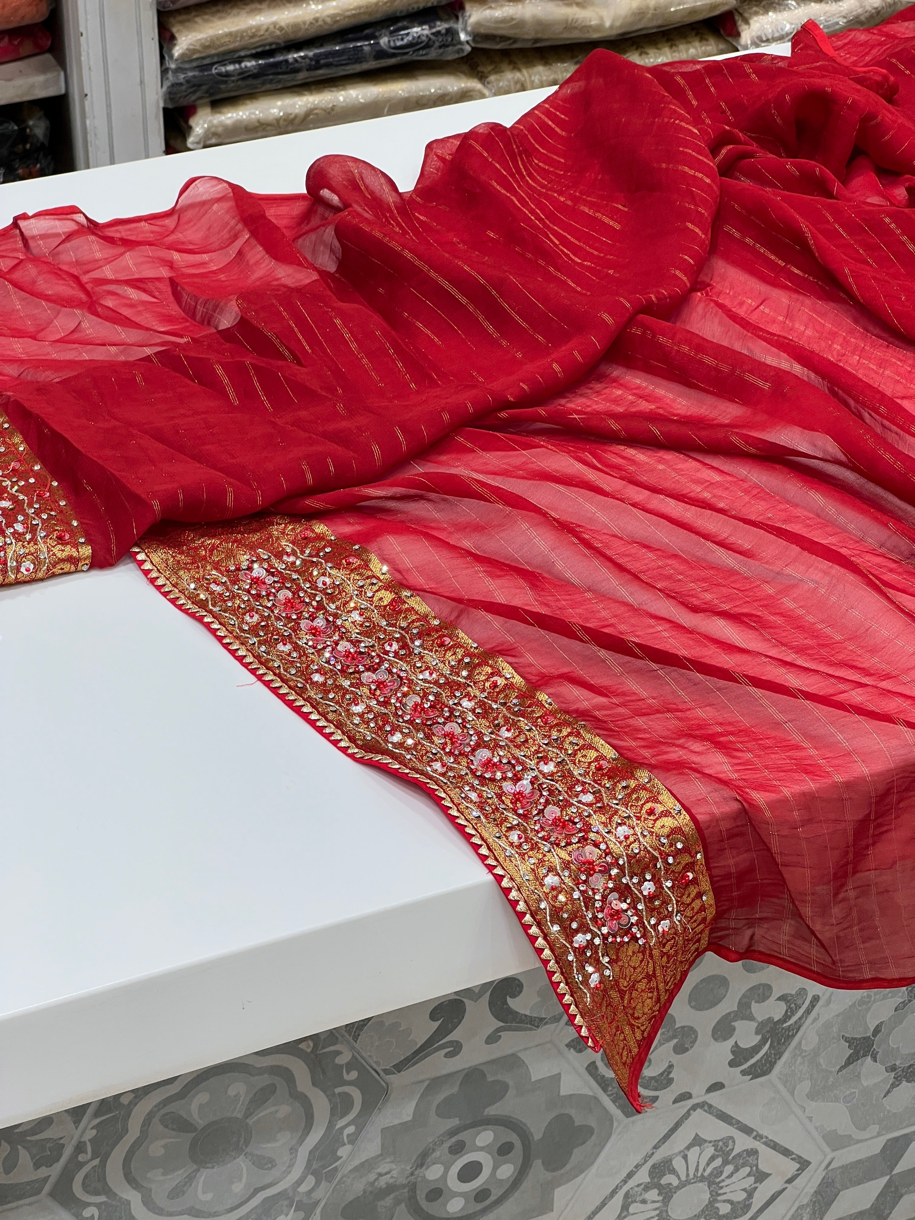 Beige Red Khaddi Georgette Hand Embroidery Saree