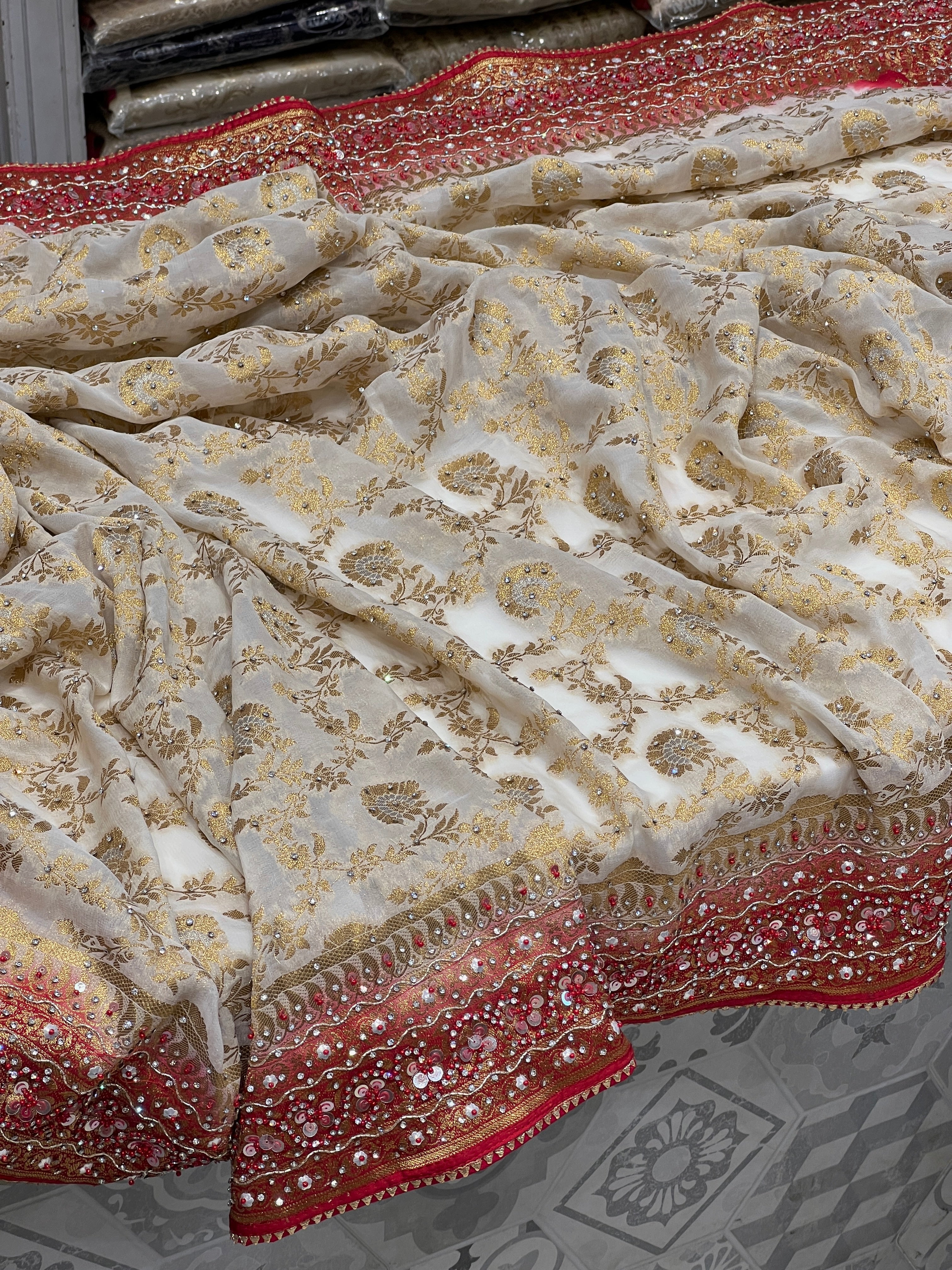 Beige Red Khaddi Georgette Hand Embroidery Saree