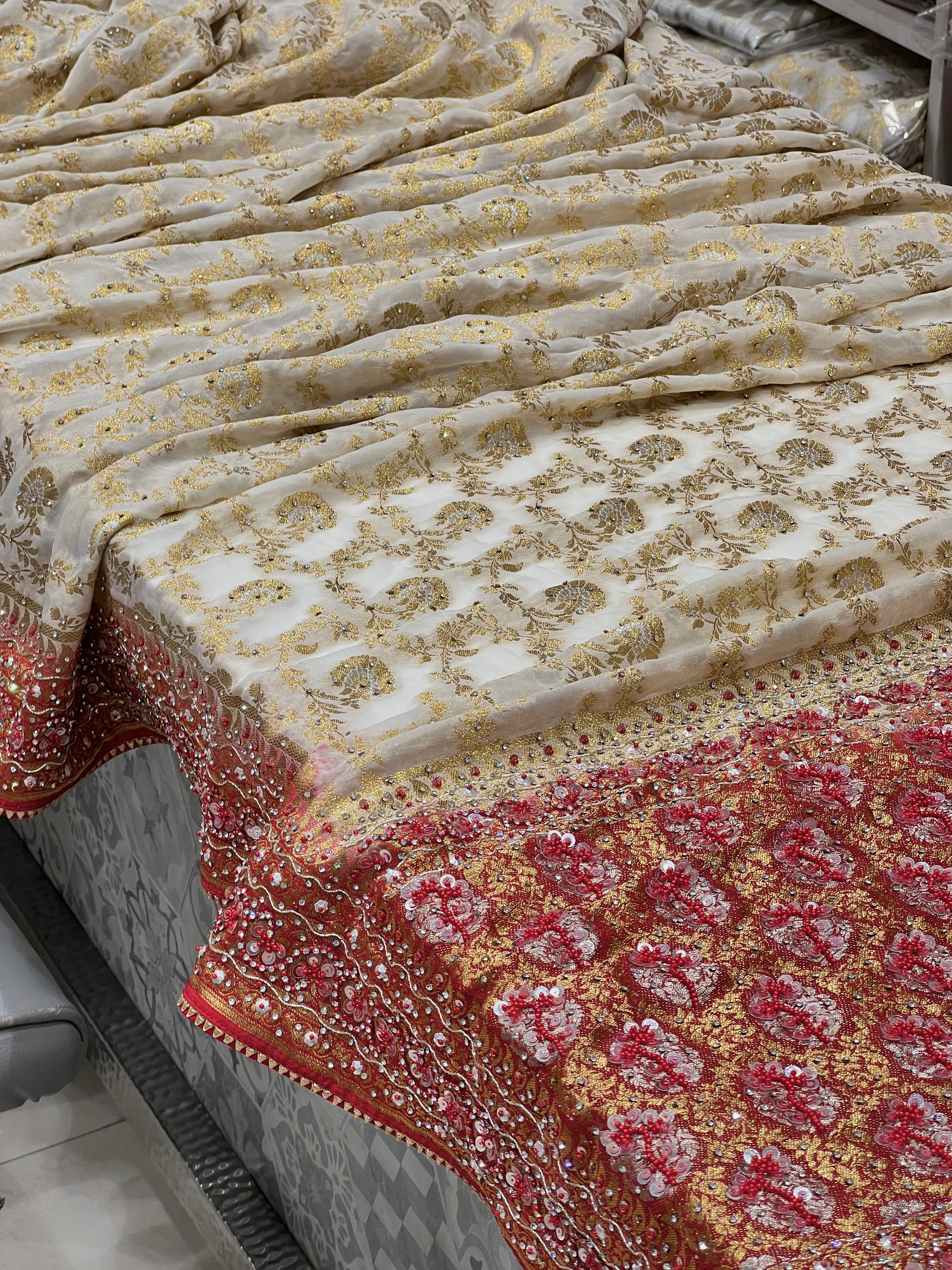 Beige Red Khaddi Georgette Hand Embroidery Saree