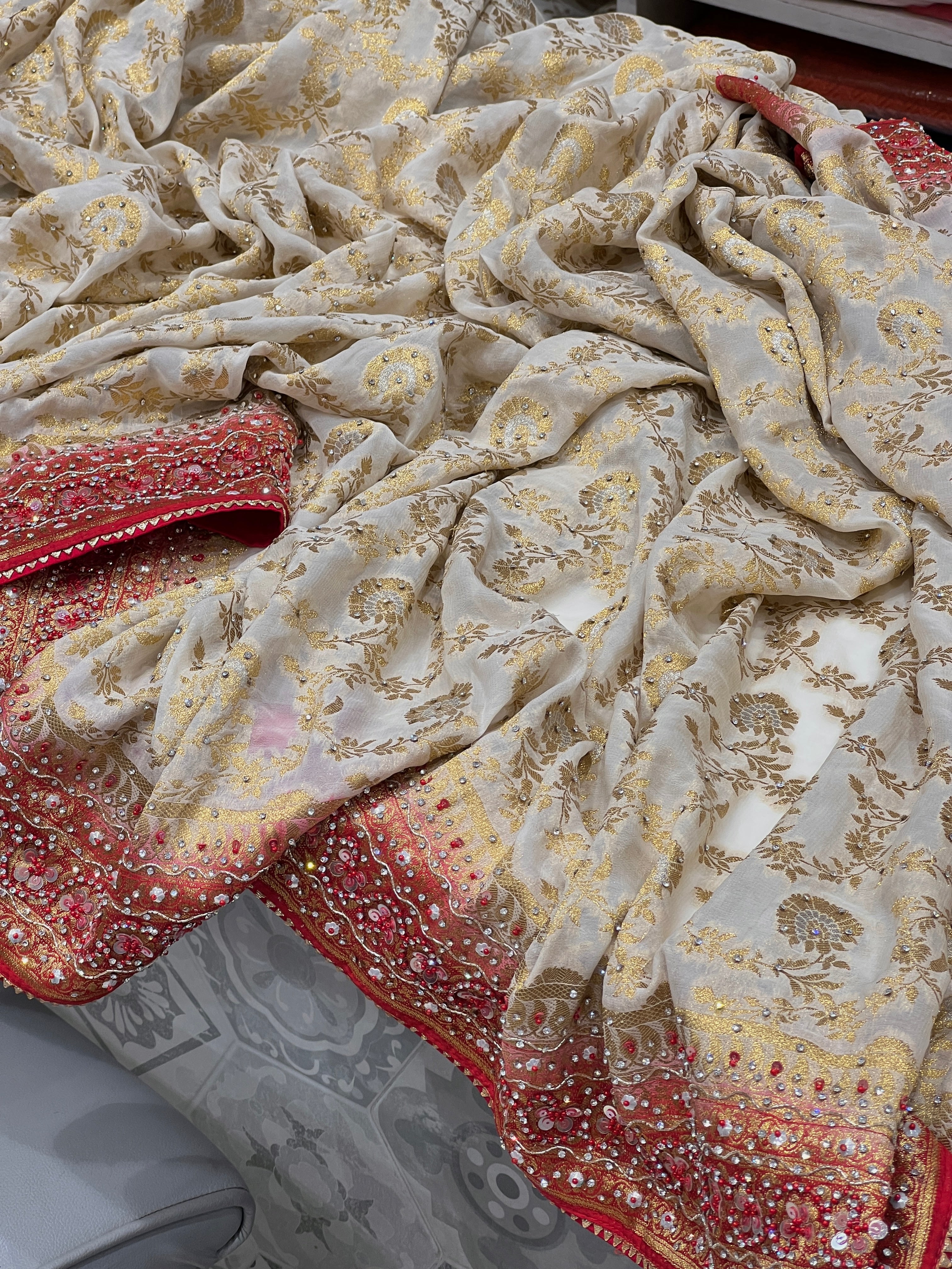 Beige Red Khaddi Georgette Hand Embroidery Saree