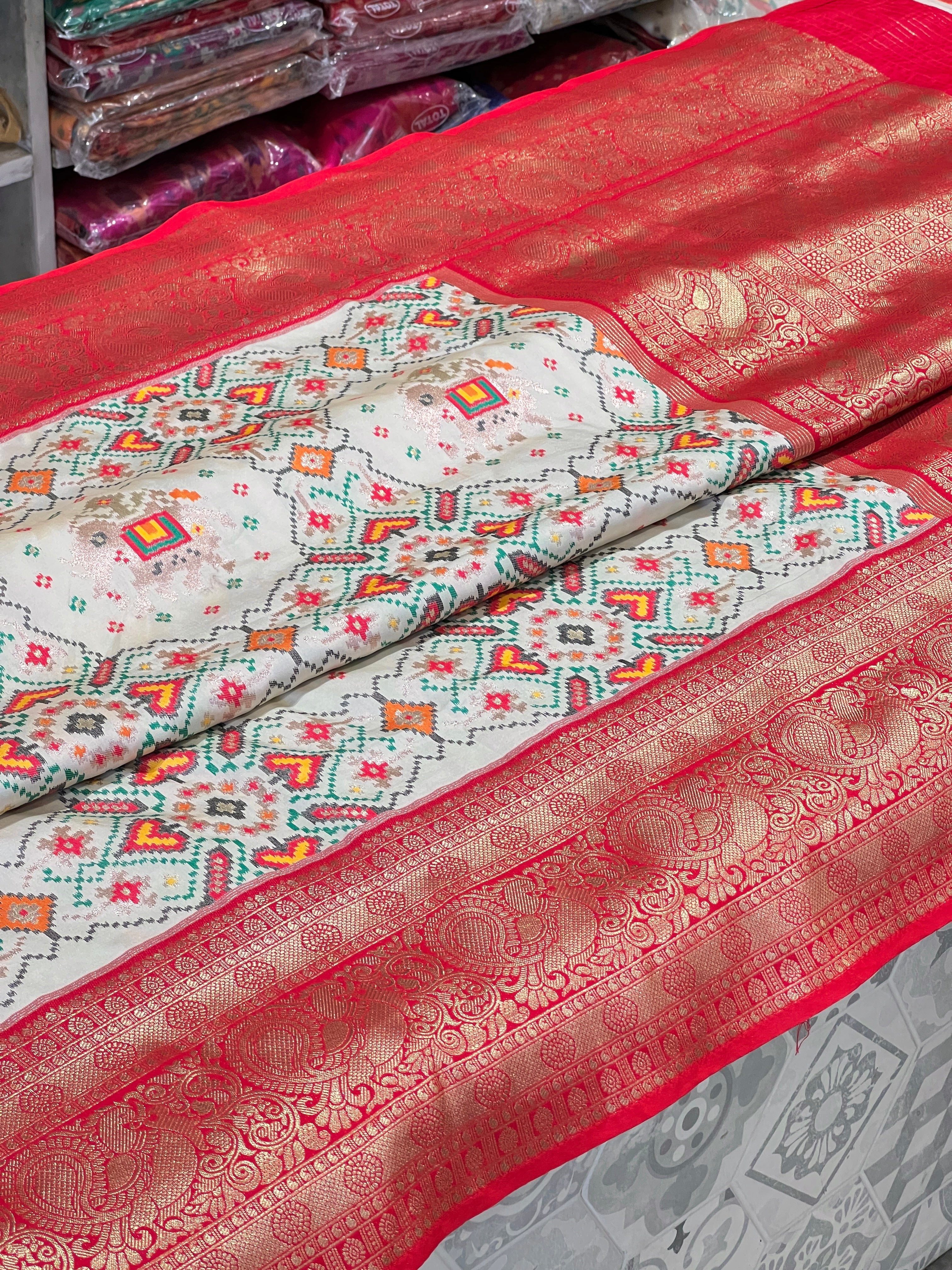 Off White Banarasi Patola Kanchi Style Border Saree