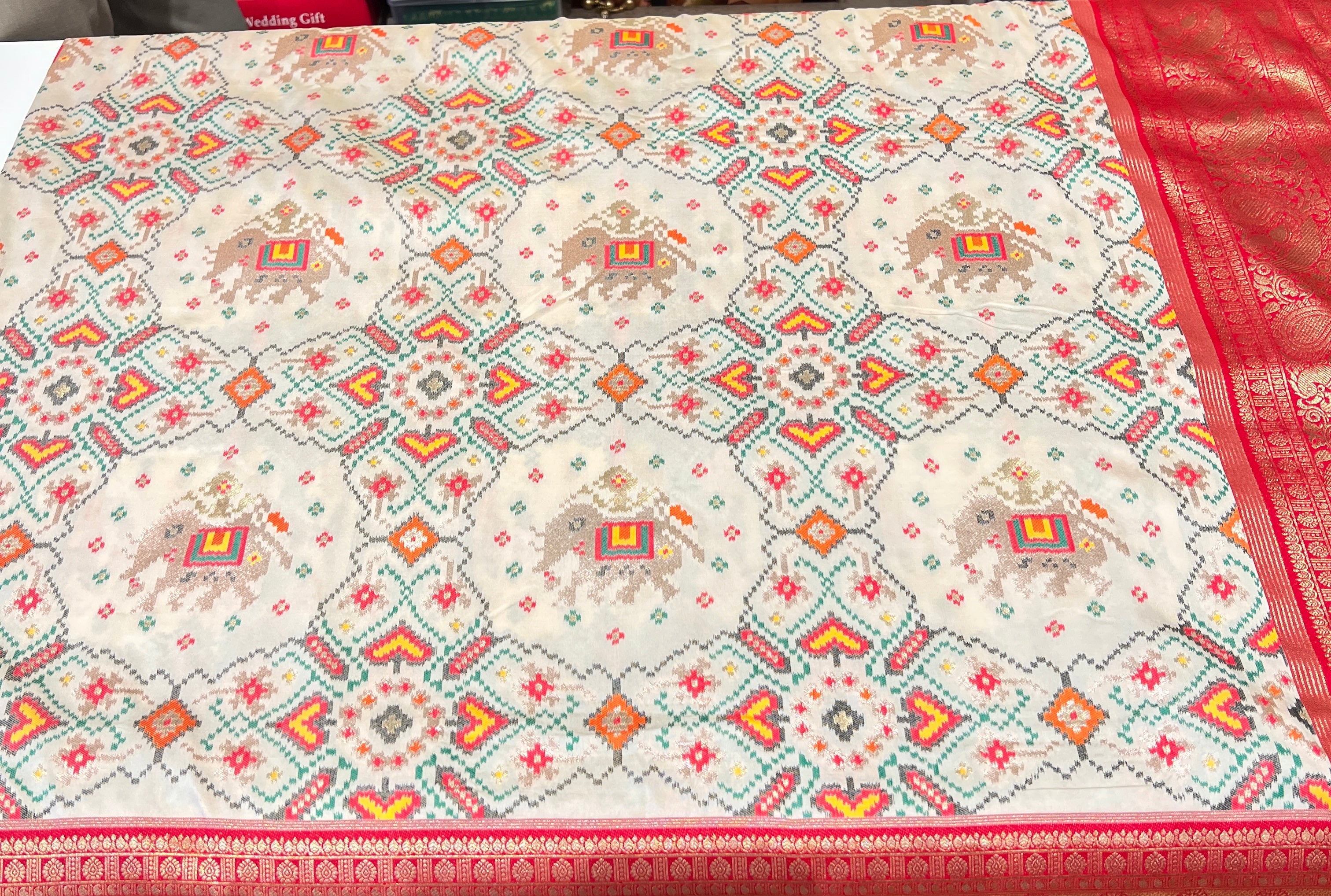 Off White Banarasi Patola Kanchi Style Border Saree