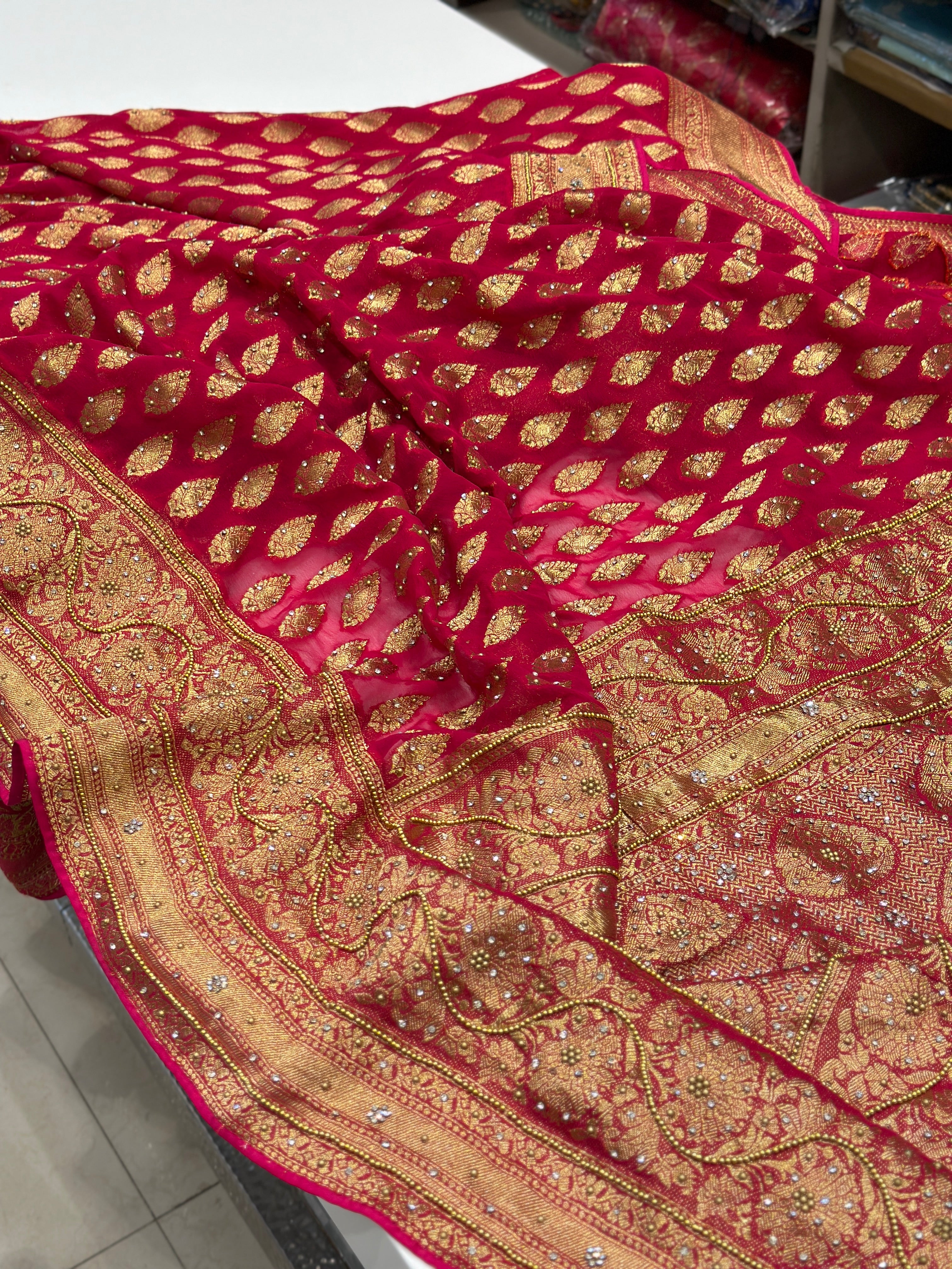 Rani Tilak Buttis Georgette Hand Embroidery Saree