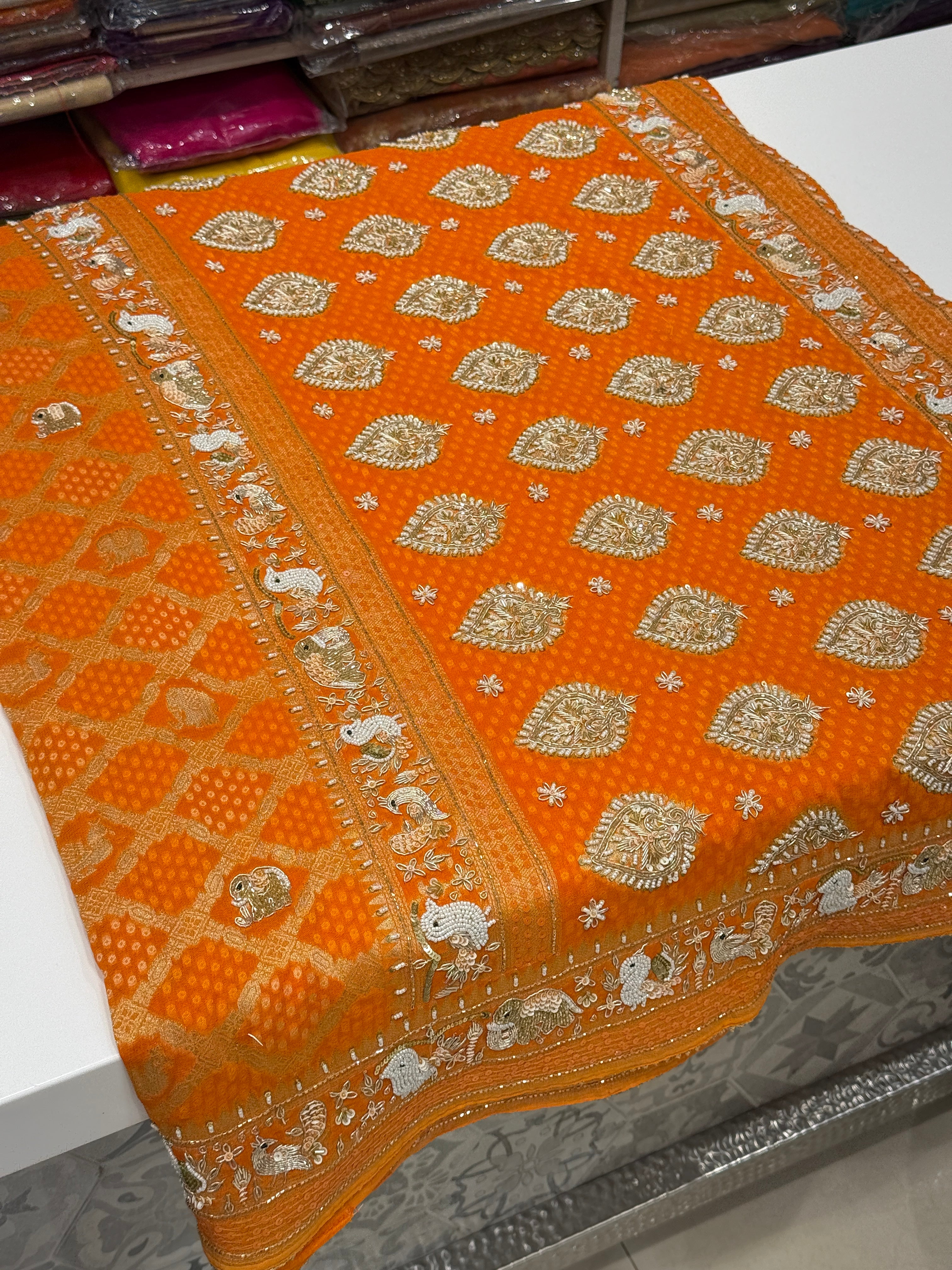 Orange Woven Bandhej Georgette Hand Embroidery Saree