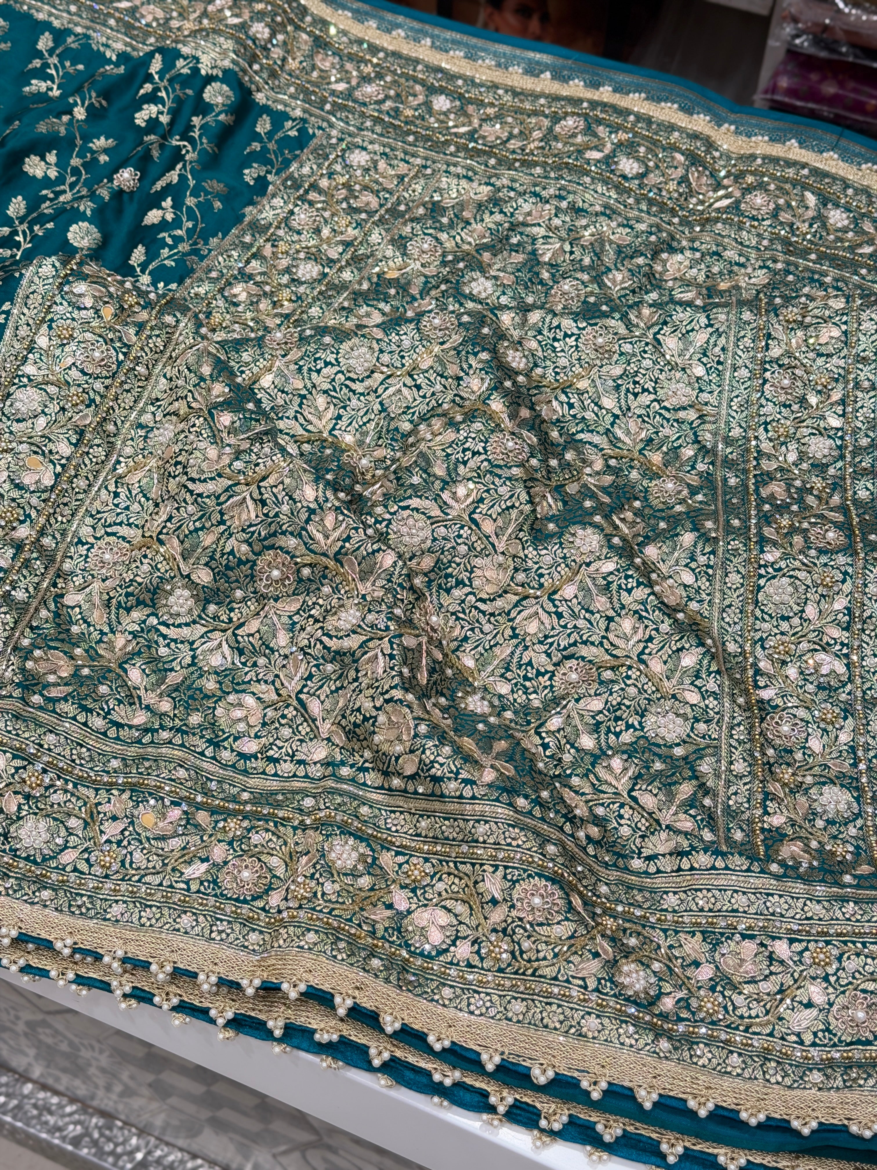 Warm Teal Green Banarasi Silk Crown Border Silk Embroidery Saree
