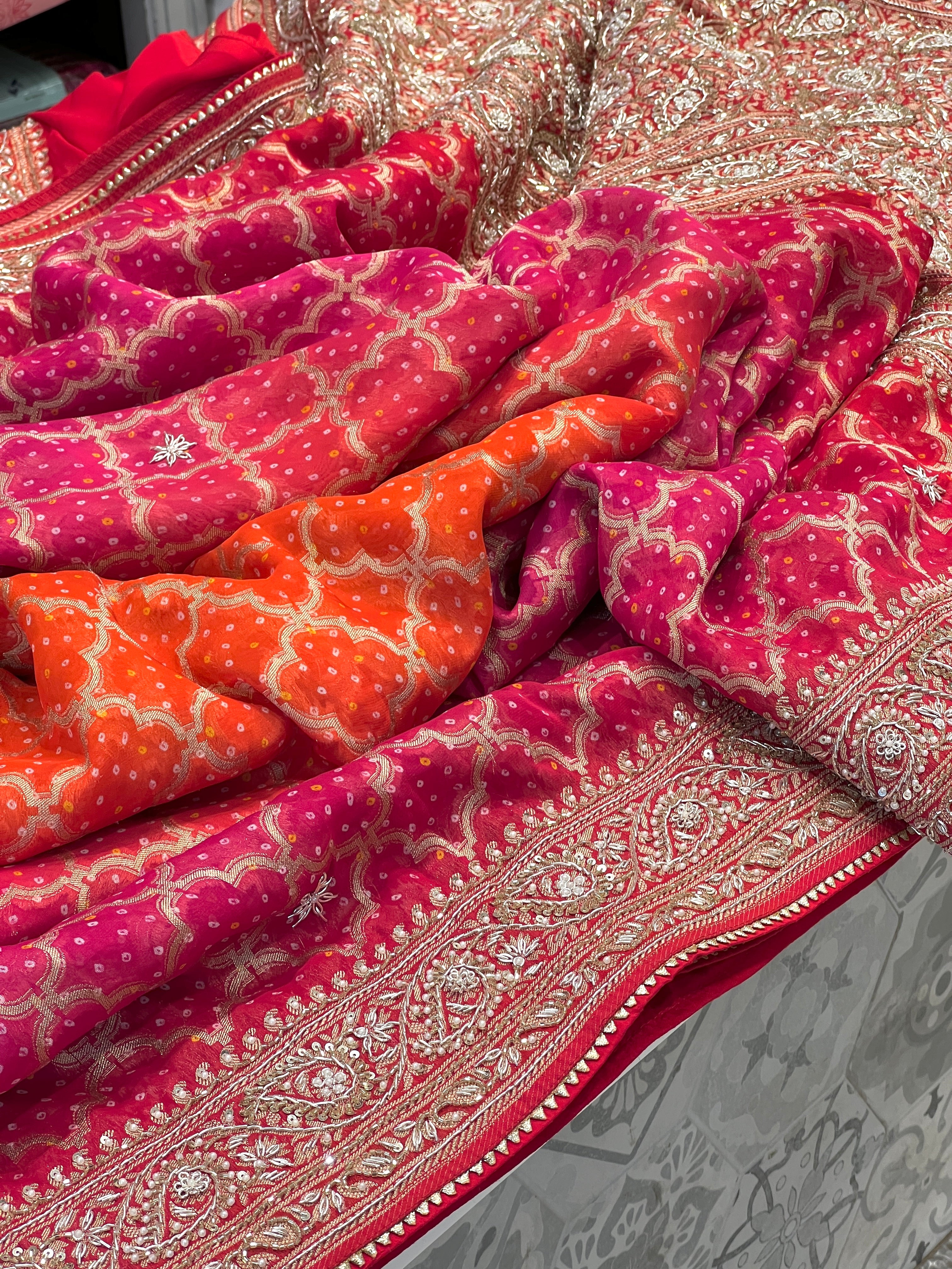 Shaded Pink Orange Bandhej Hand Embroidery Saree