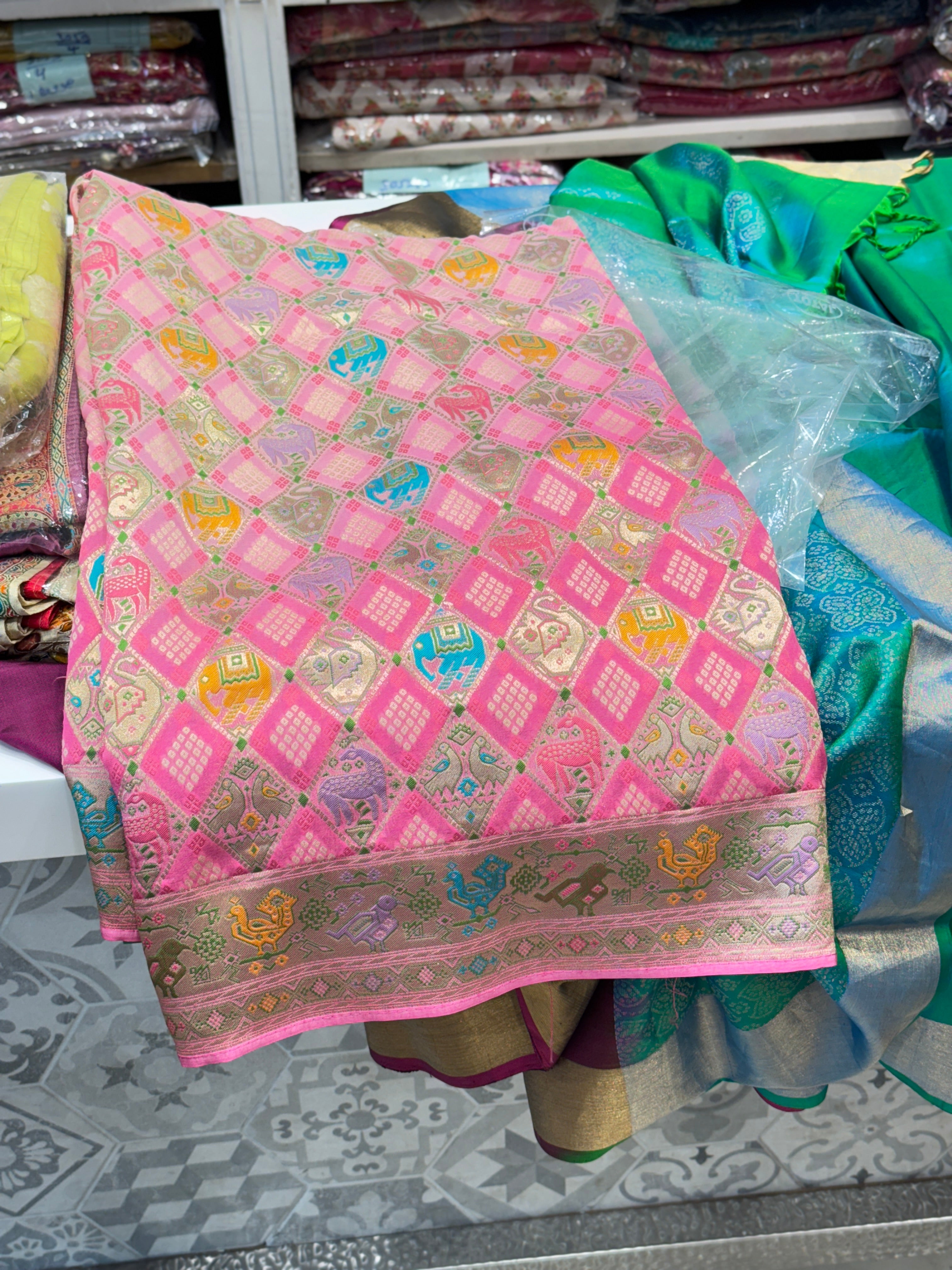 Shaded Pink Georgette Woven Bandhej Patola Saree