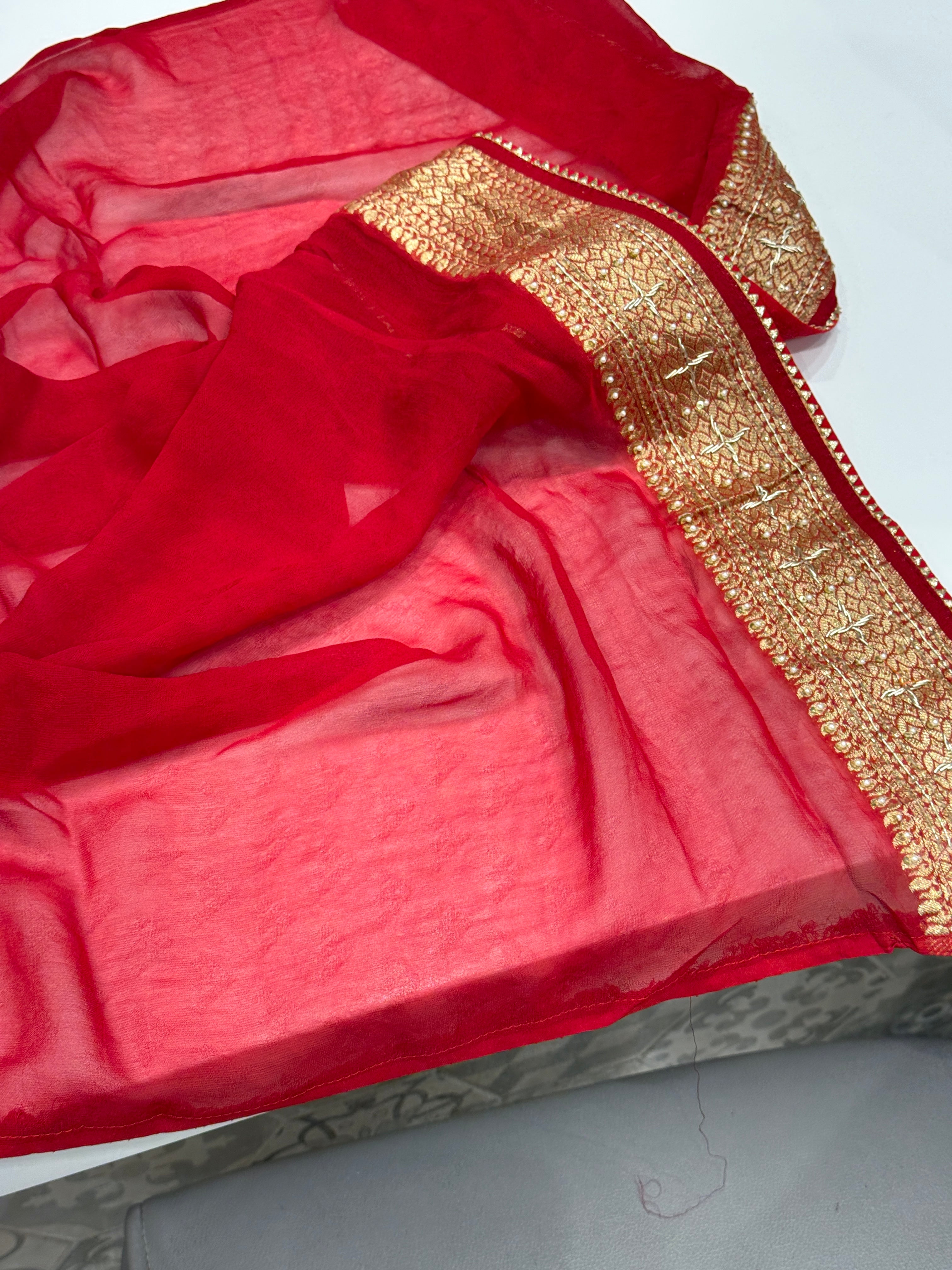 Red Bandhej Georgette Elephant Theme Hand Embroidery Saree