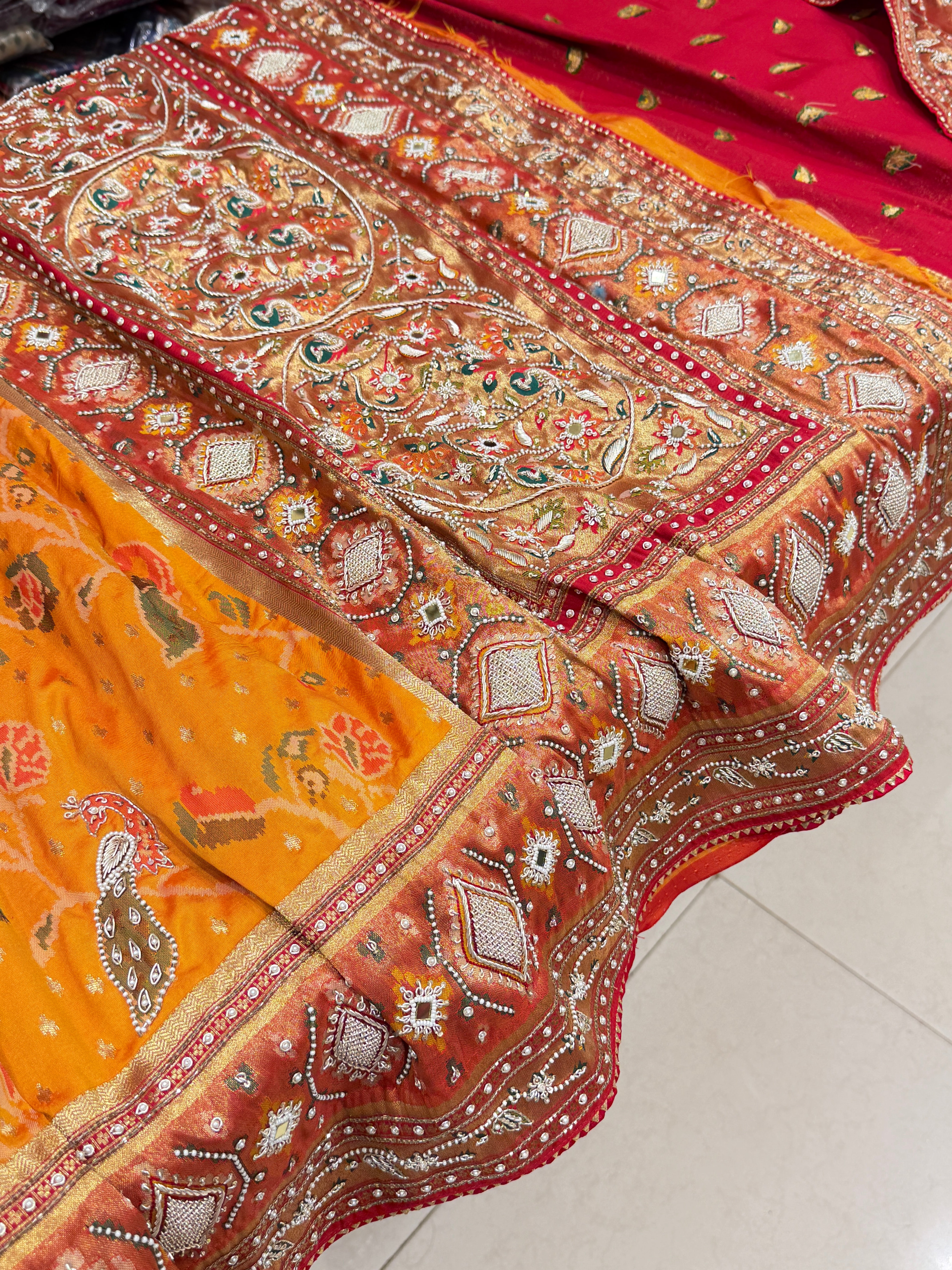 Rust Orange Patola Peacock Motif Zardosi Hand Embroidery Saree