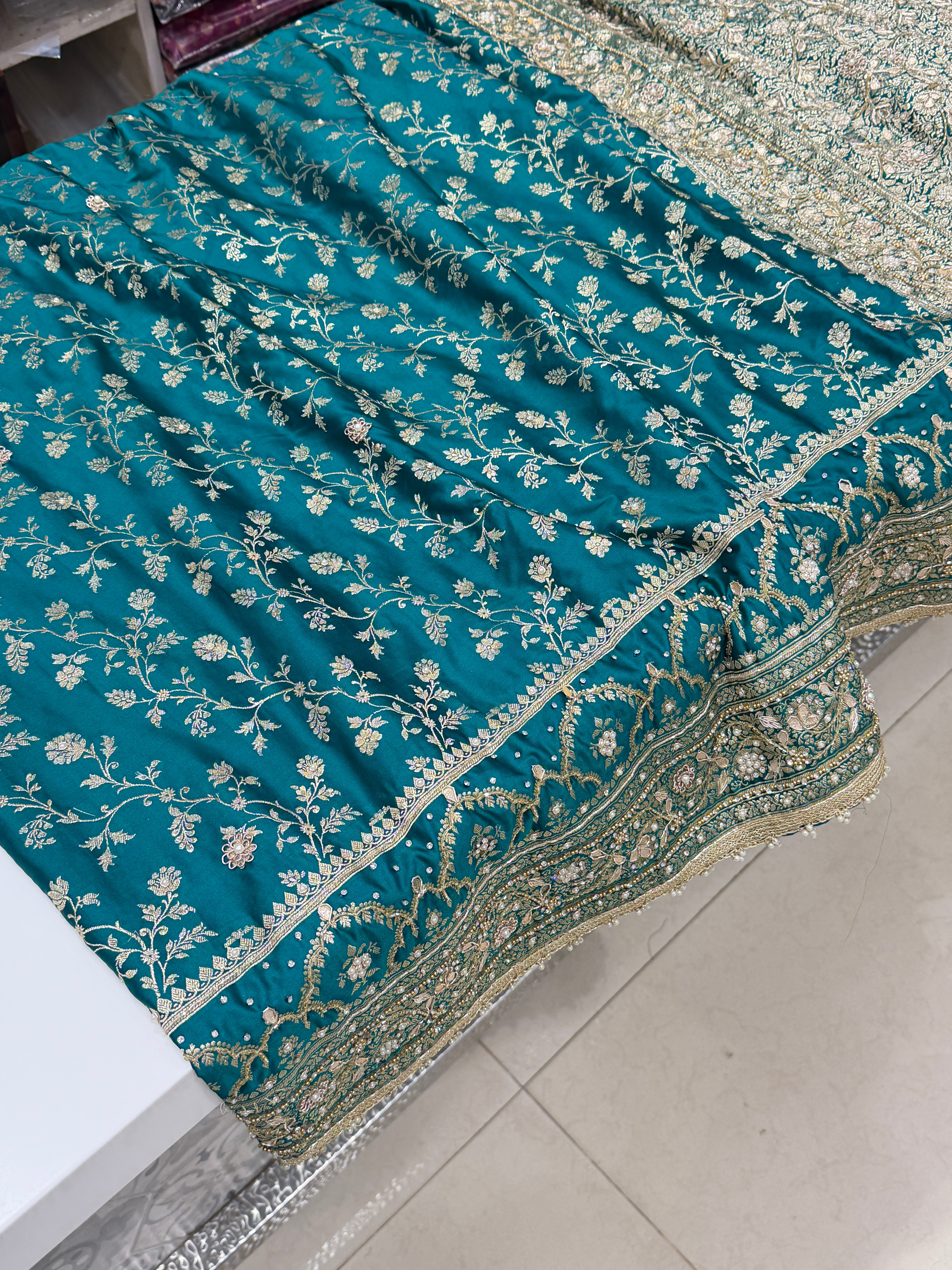 Warm Teal Green Banarasi Silk Crown Border Silk Embroidery Saree