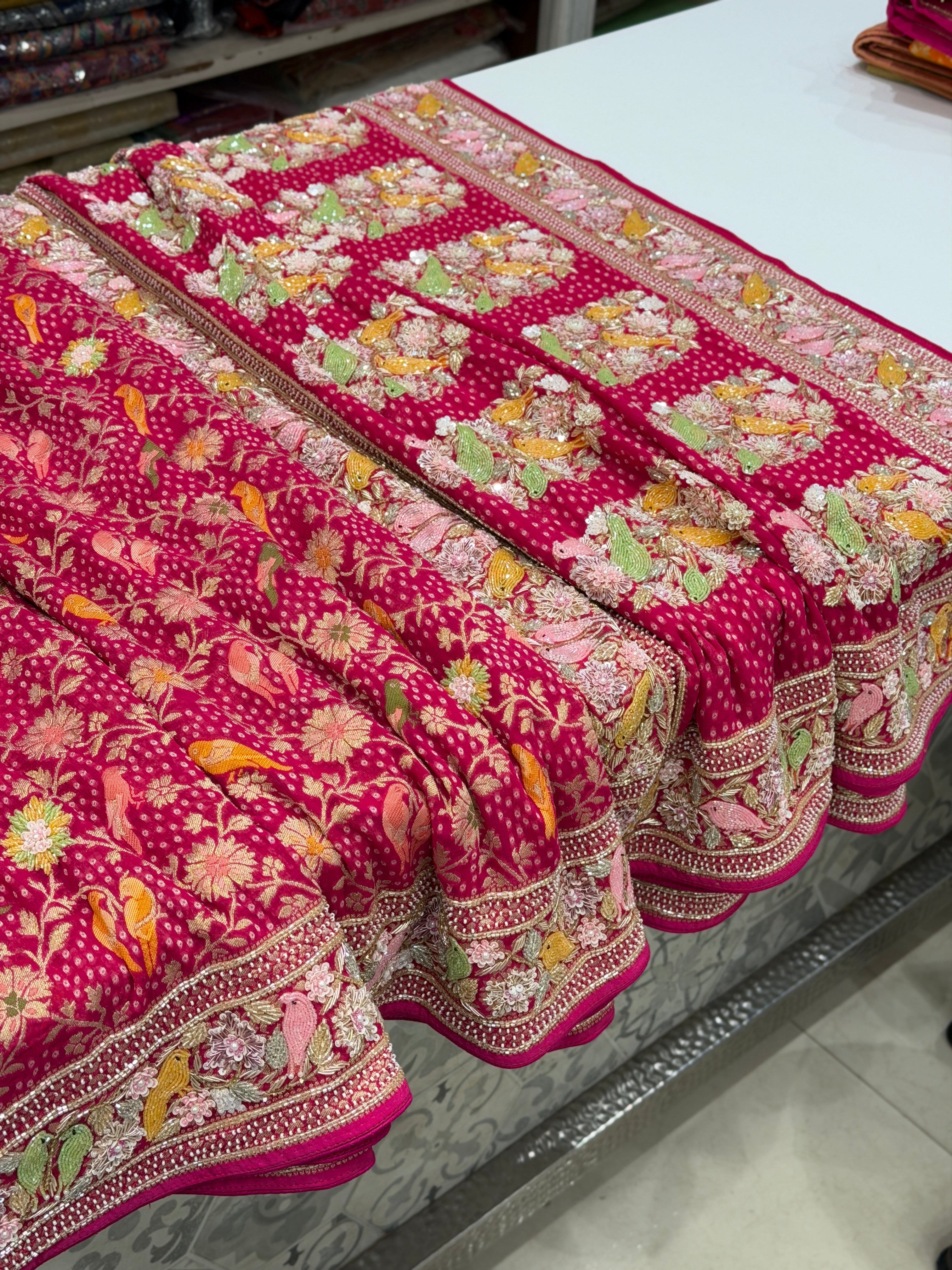 Rani Pink Weaved Bandhej Parrot Motifs Georgette Moti Zardodi Hand Embroidery Saree