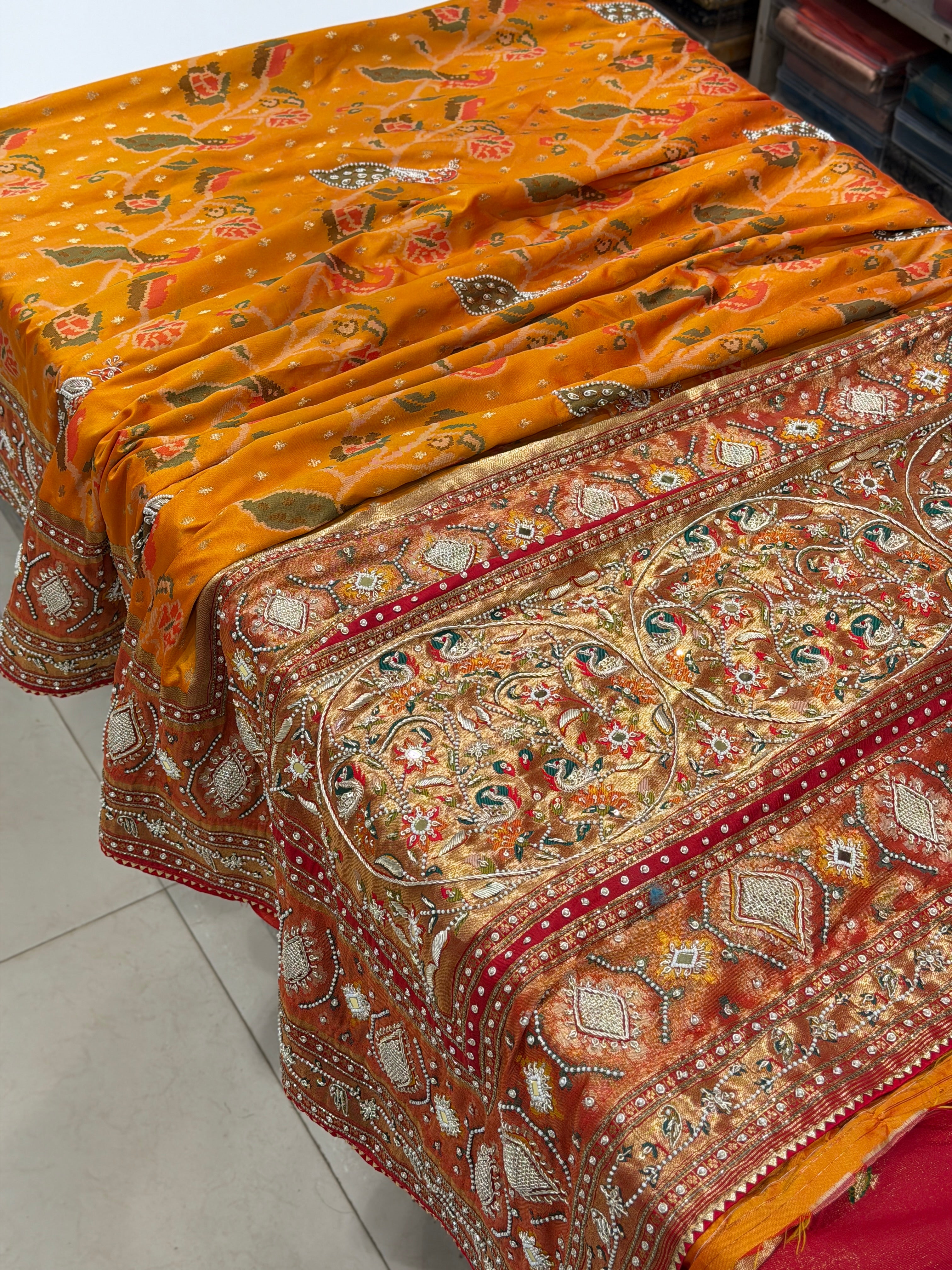 Rust Orange Patola Peacock Motif Zardosi Hand Embroidery Saree
