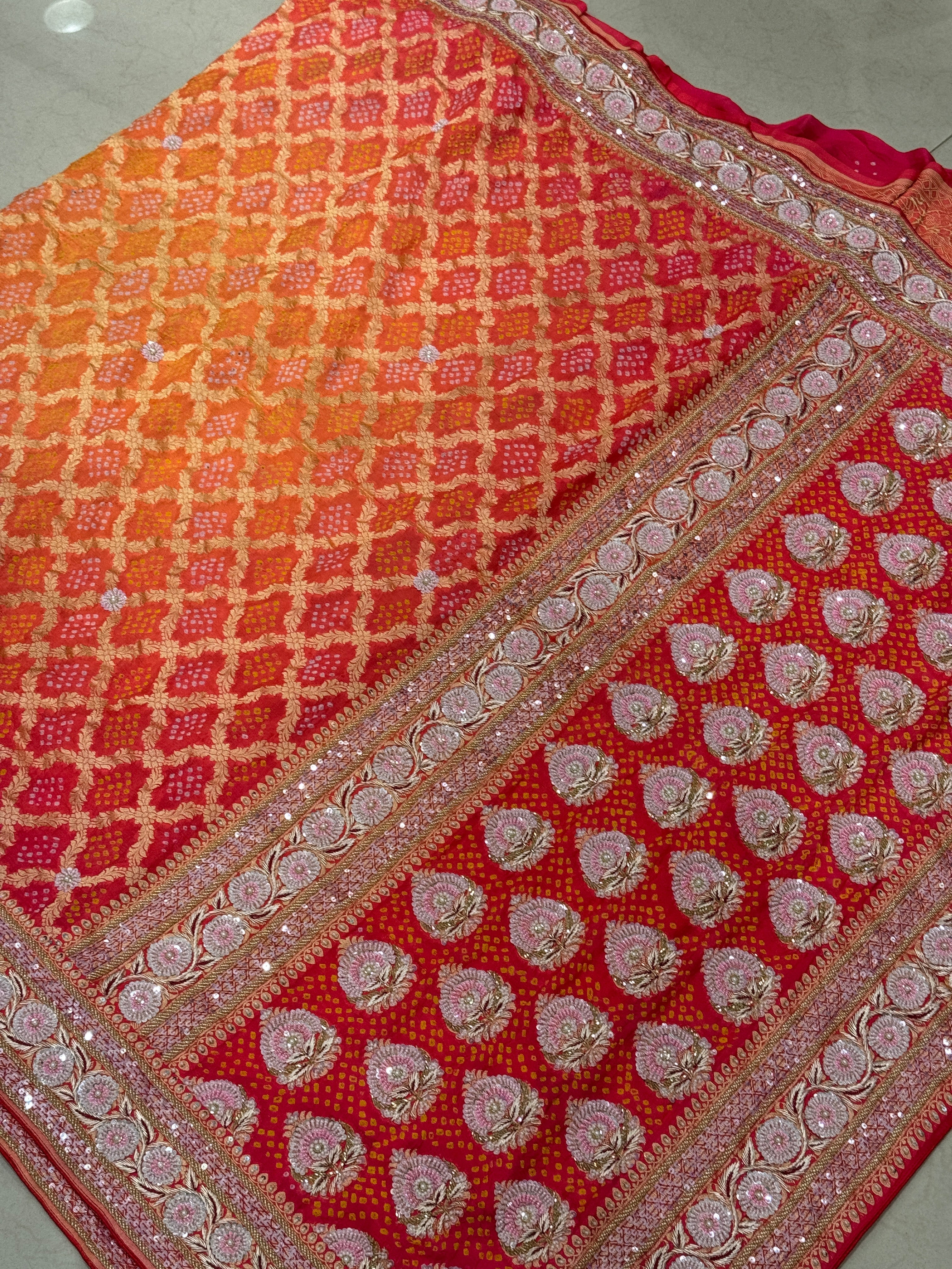 Shaded Peach Orange Bandhej Hand Embroidery Saree