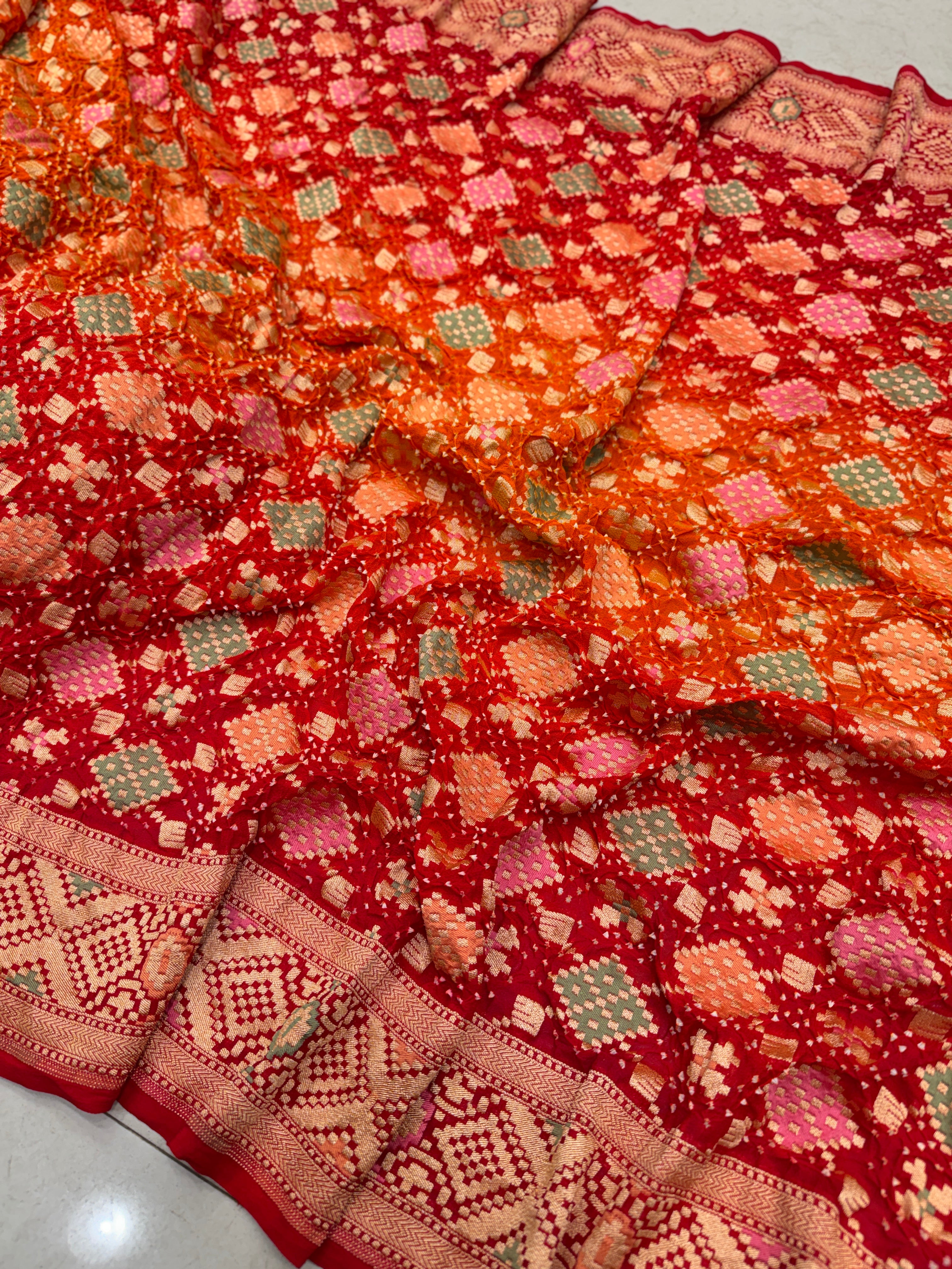 Orange Red Shaded Patola Weave Meenakari Georgette Bandhej Saree