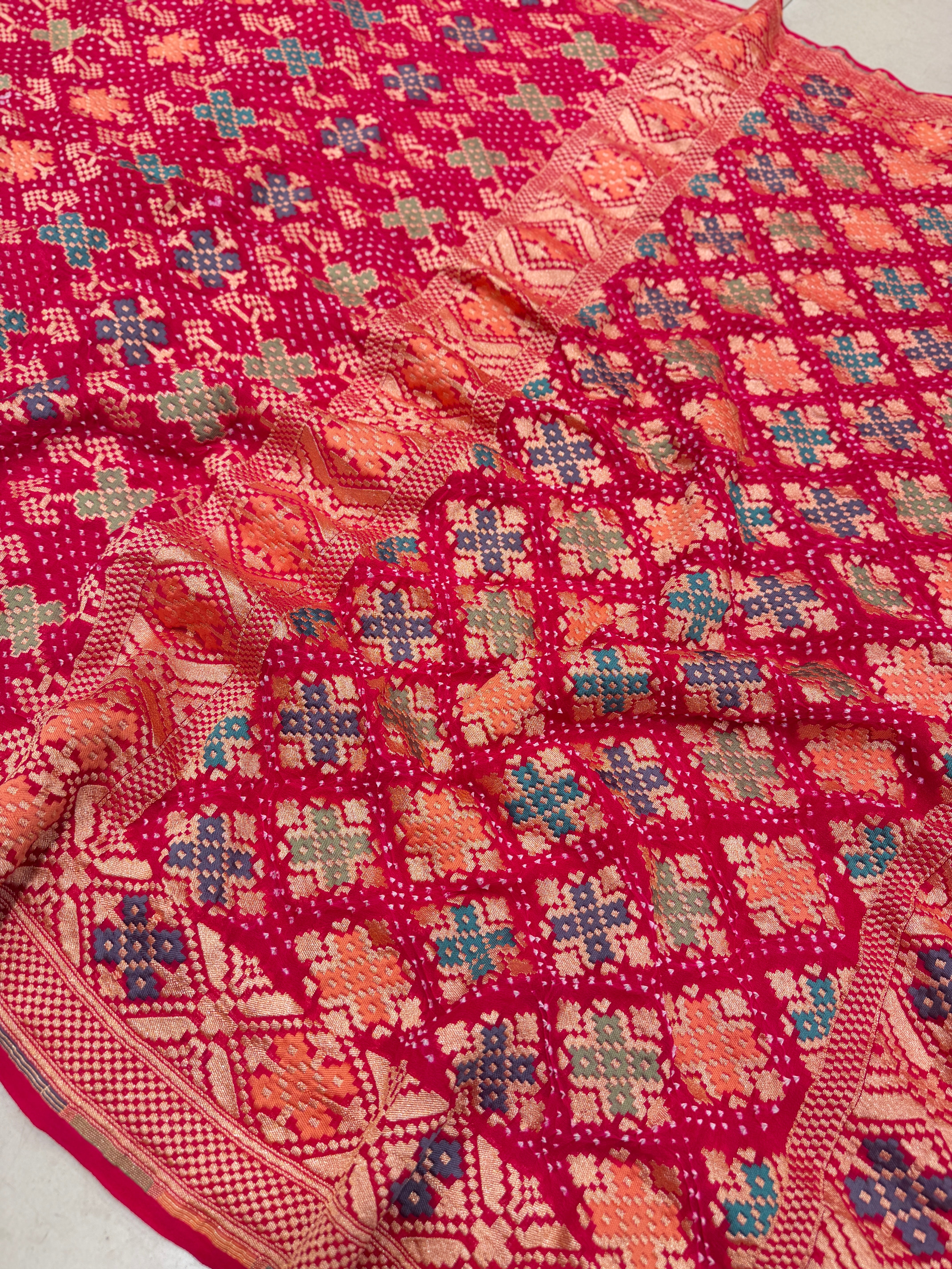 Crimson Rani Patola Weave Meenakari Georgette Bandhej Saree