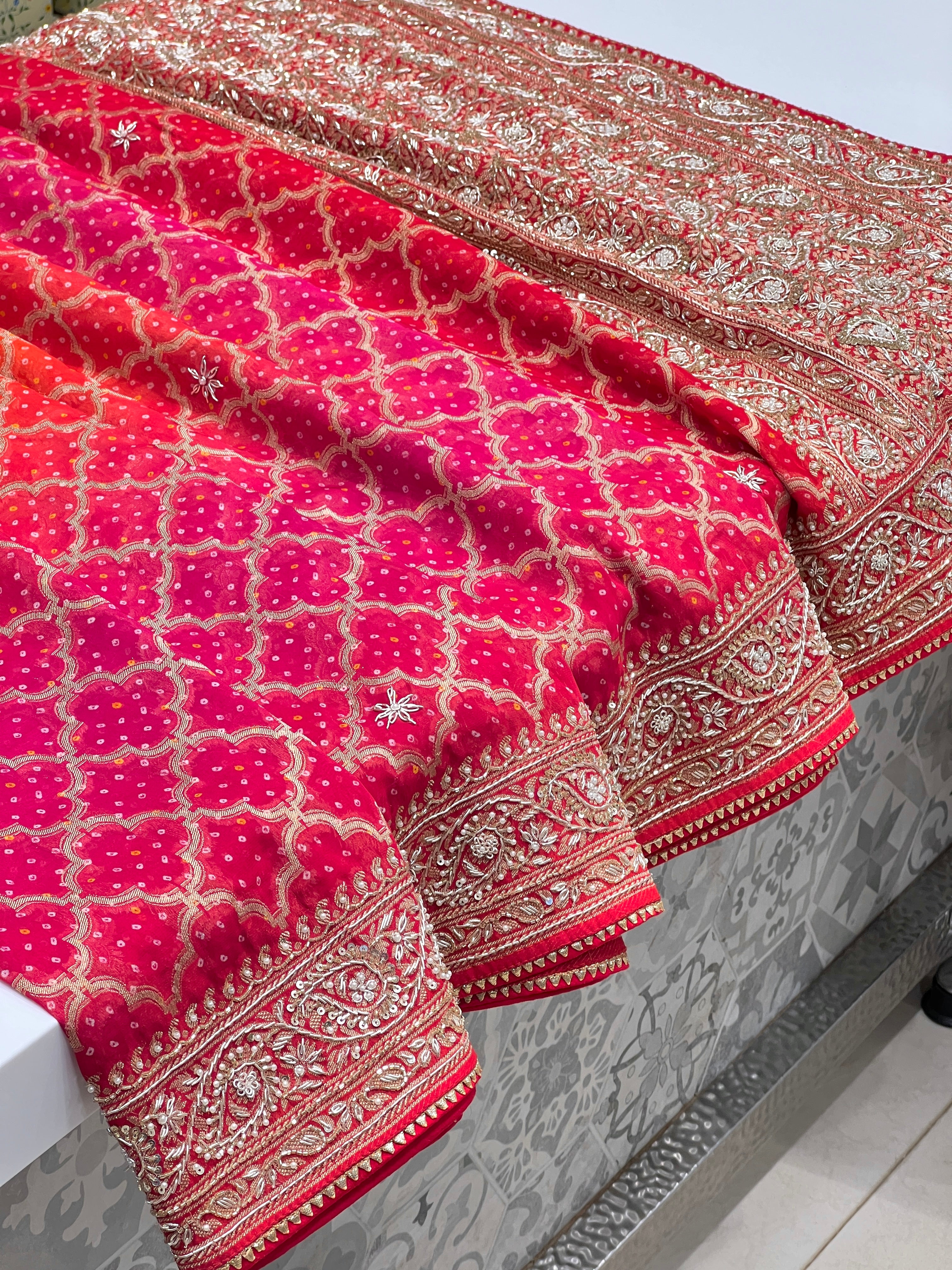 Shaded Pink Orange Bandhej Hand Embroidery Saree