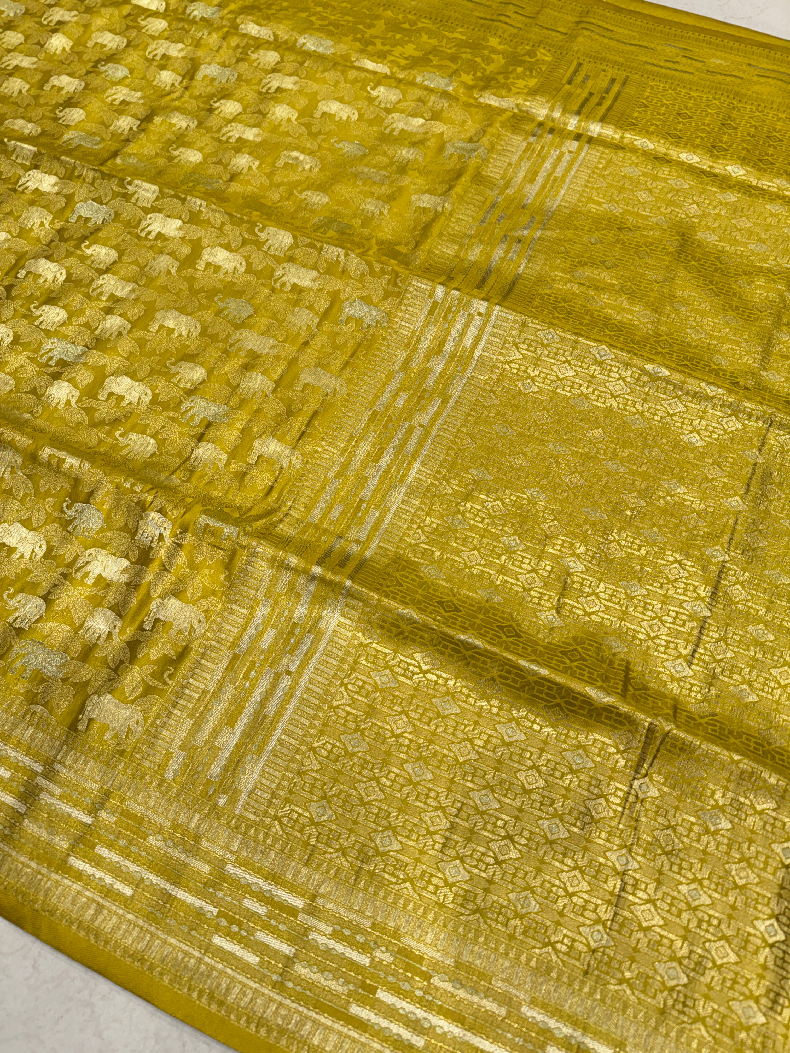 Mehendi Green Banarasi Soft Silk Semi Elephant Motif Saree