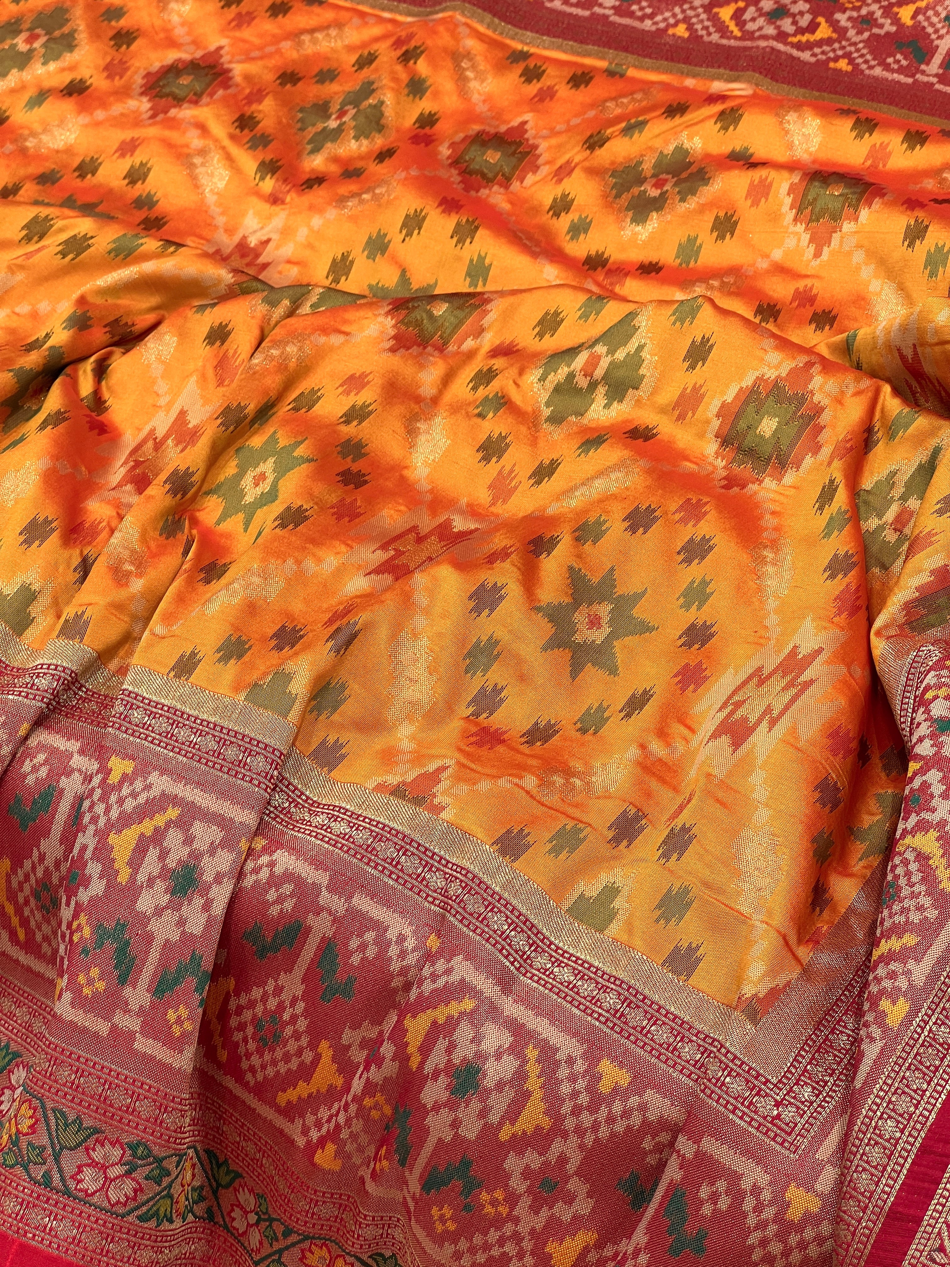 Light Orange Patola Saree with Contrast Blouse