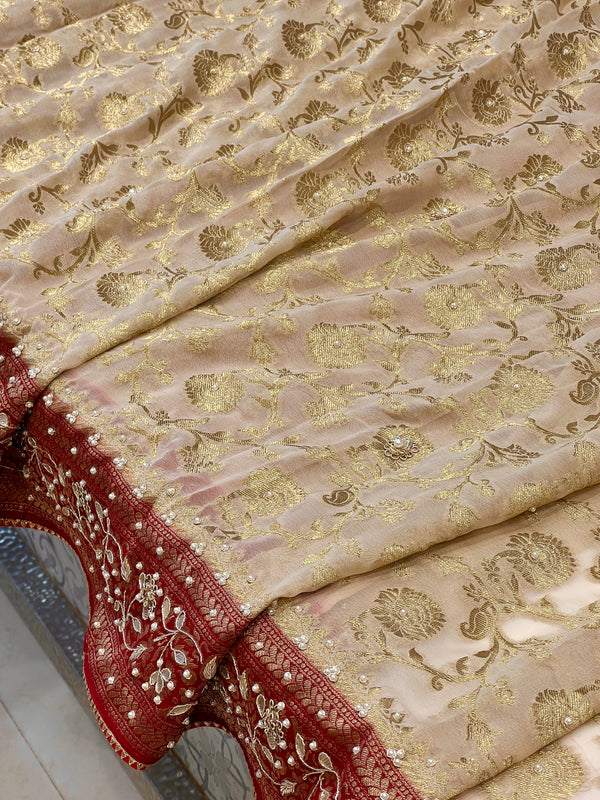 Beige Georgette Jaal Saree with Moti Hand Embroidery and Red Border