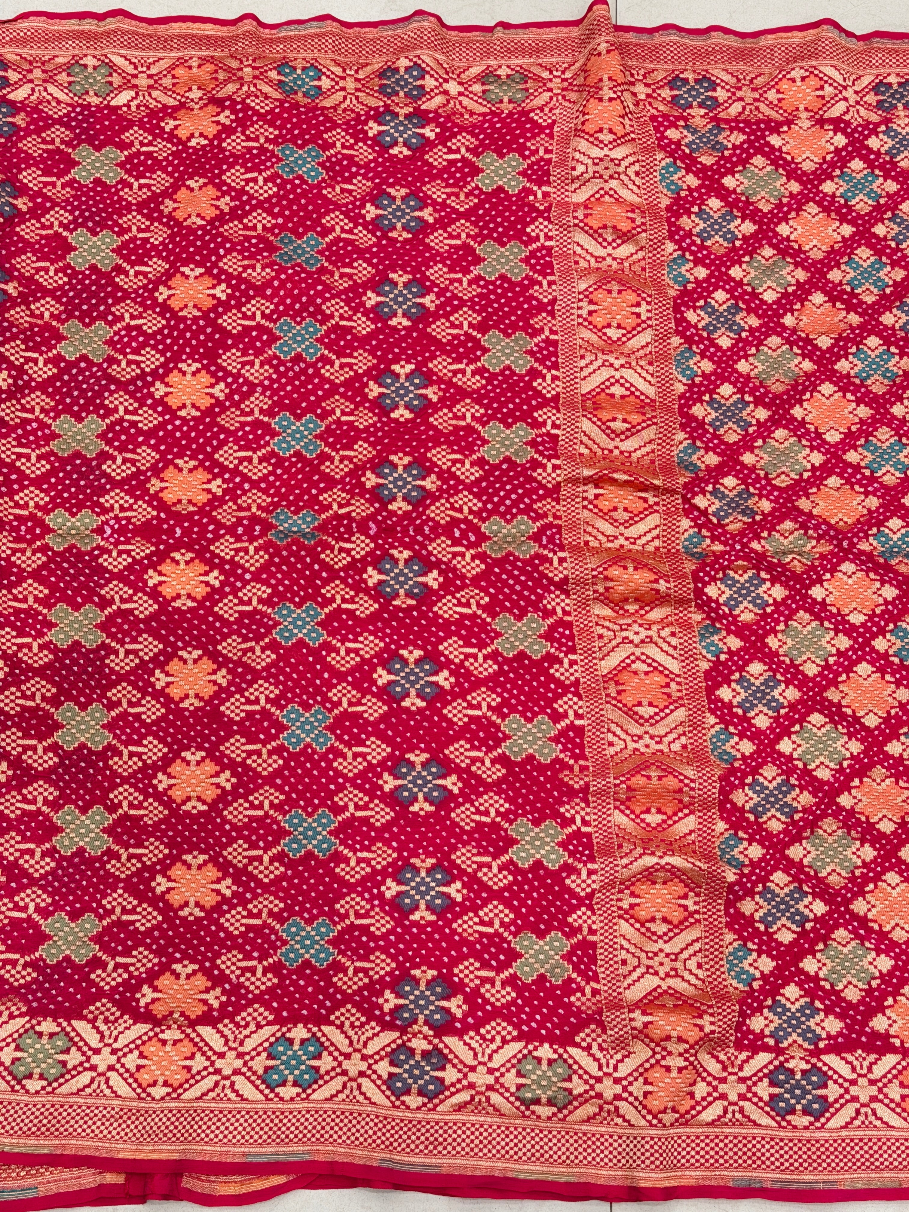 Crimson Rani Patola Weave Meenakari Georgette Bandhej Saree