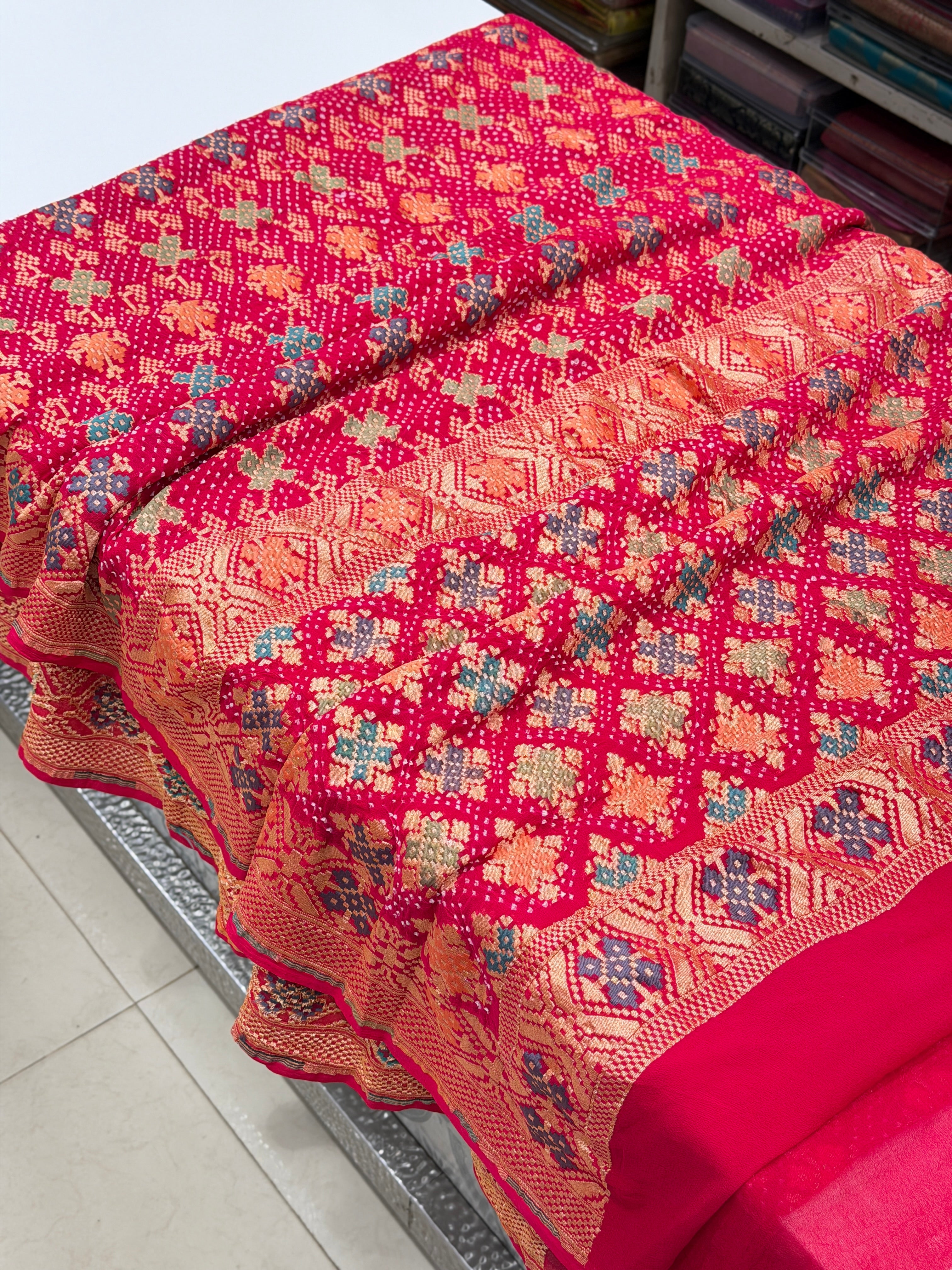 Crimson Rani Patola Weave Meenakari Georgette Bandhej Saree